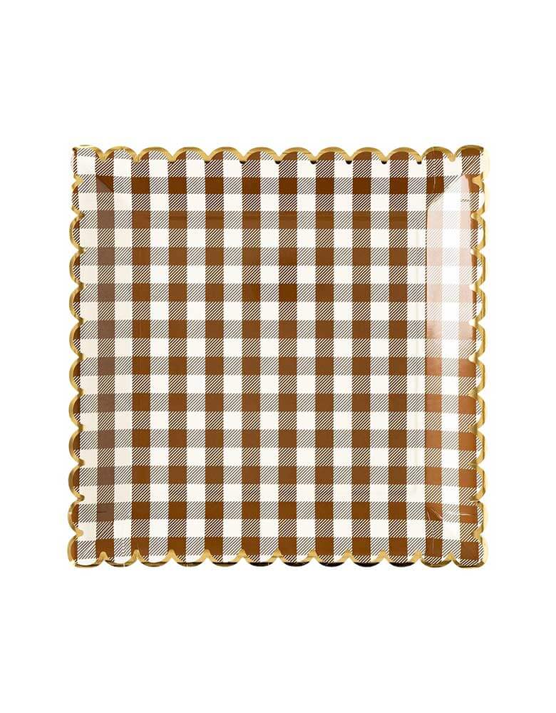 Momo Party's 10" Brown Gingham Scalloped Plates. This harvest tabletop essential adds a pinch of charm to any meal. Elevate your tabletop game with this chic and playful design.