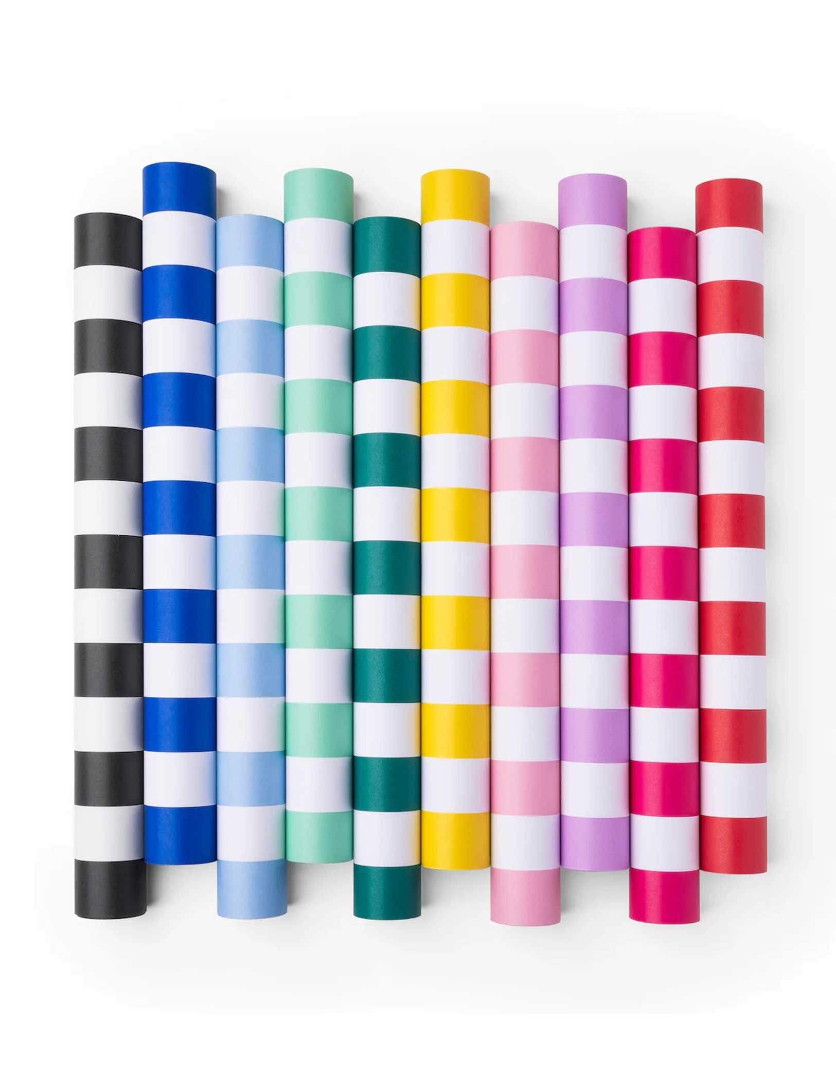 Momo Party's 19.5" x 150" Cabana Stripe Table Runner Collection by Bonjour Fete. Made with FSC-certified paper, these striped table runners come in multiple colors including sky blue, dark blue, yellow, mint, emerald green, lilac, pink, red, yellow, black and more. Made from top-quality fabric and featuring bold, these stylish striped table runner are perfect for brightening up any party.