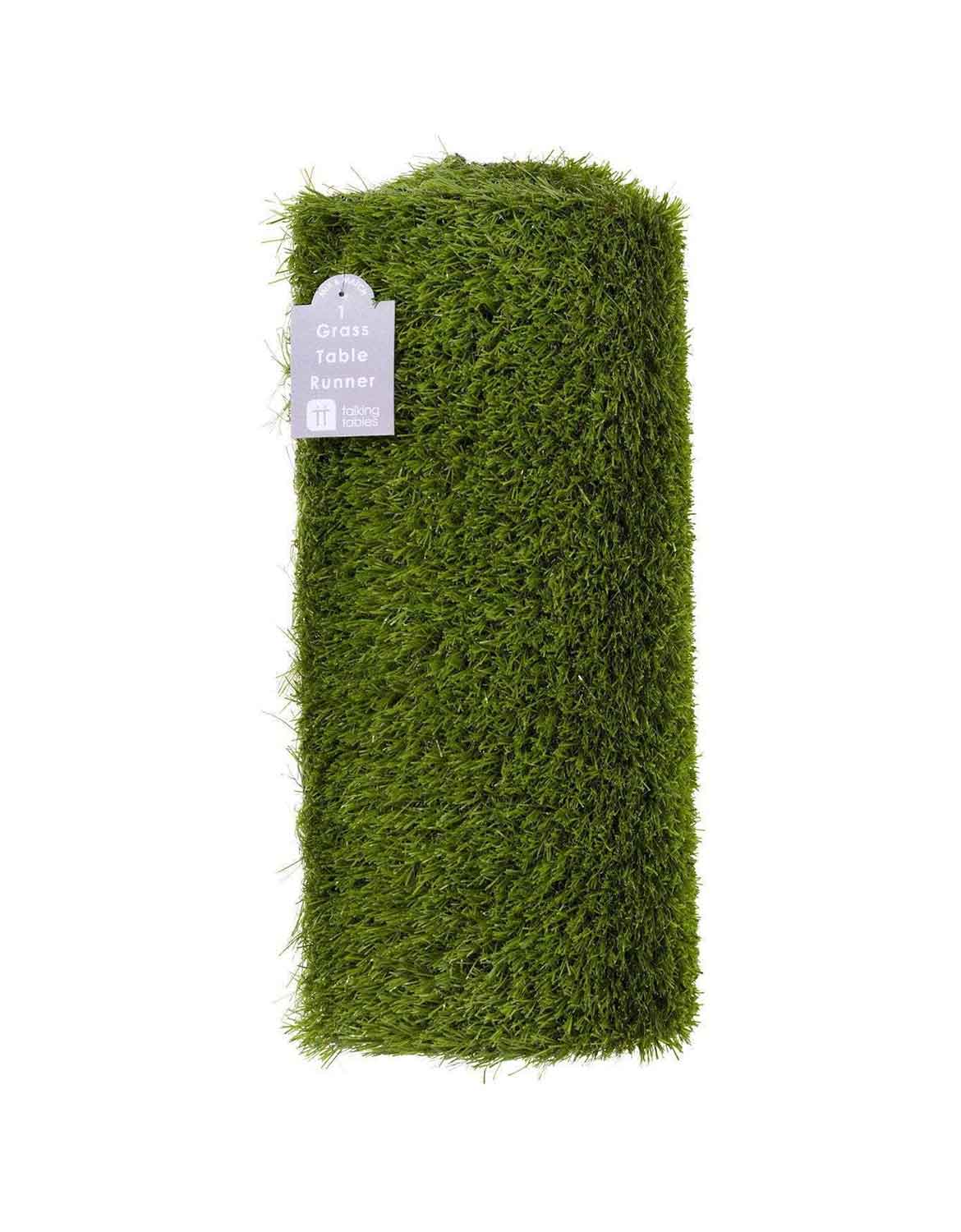 Momo Party's rolled faux green grass table runner in plastic material by Talking Tables, shown on a plain white background.