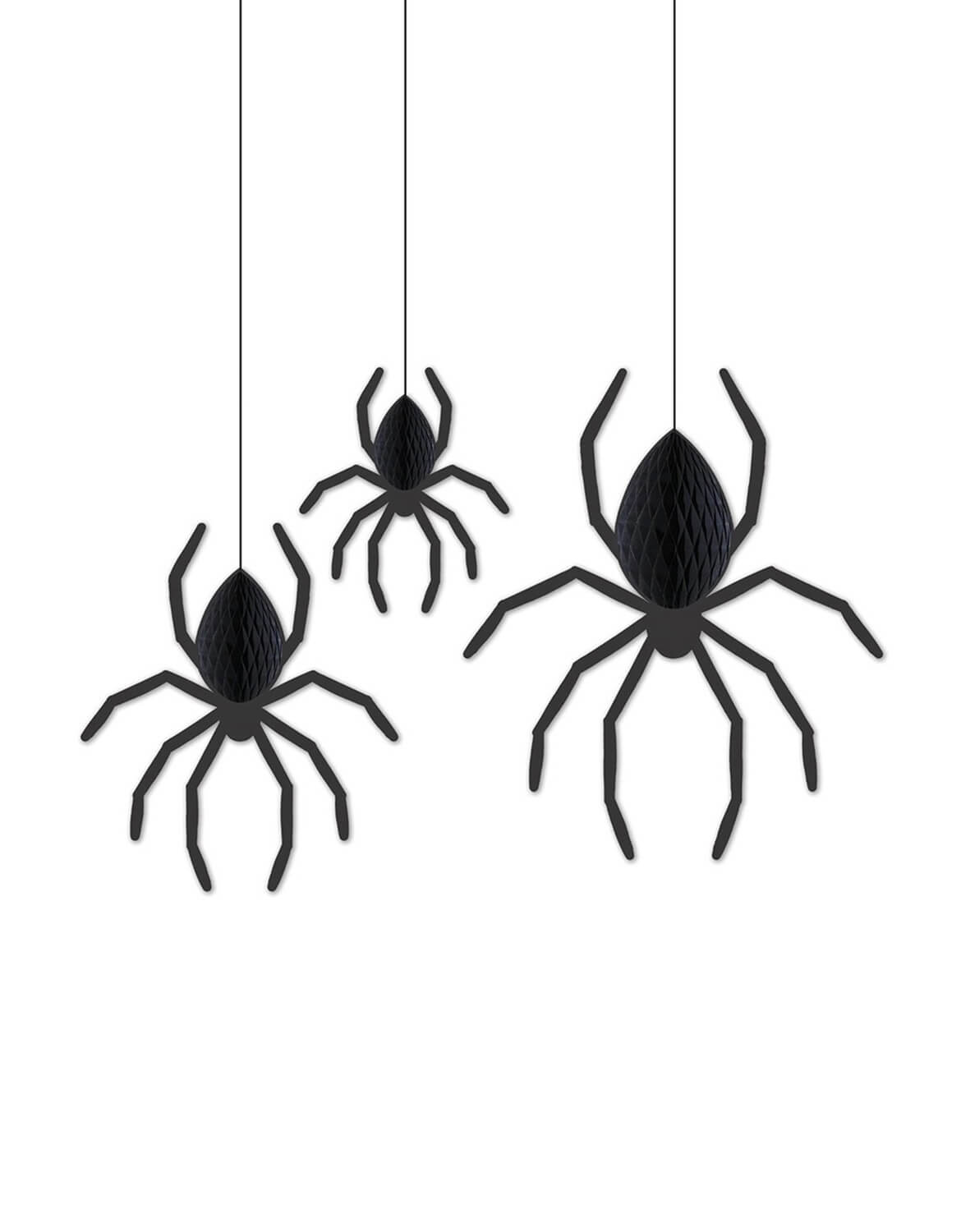 Three black hanging spider decorations of different sizes suspended by thin strings against a plain white background.