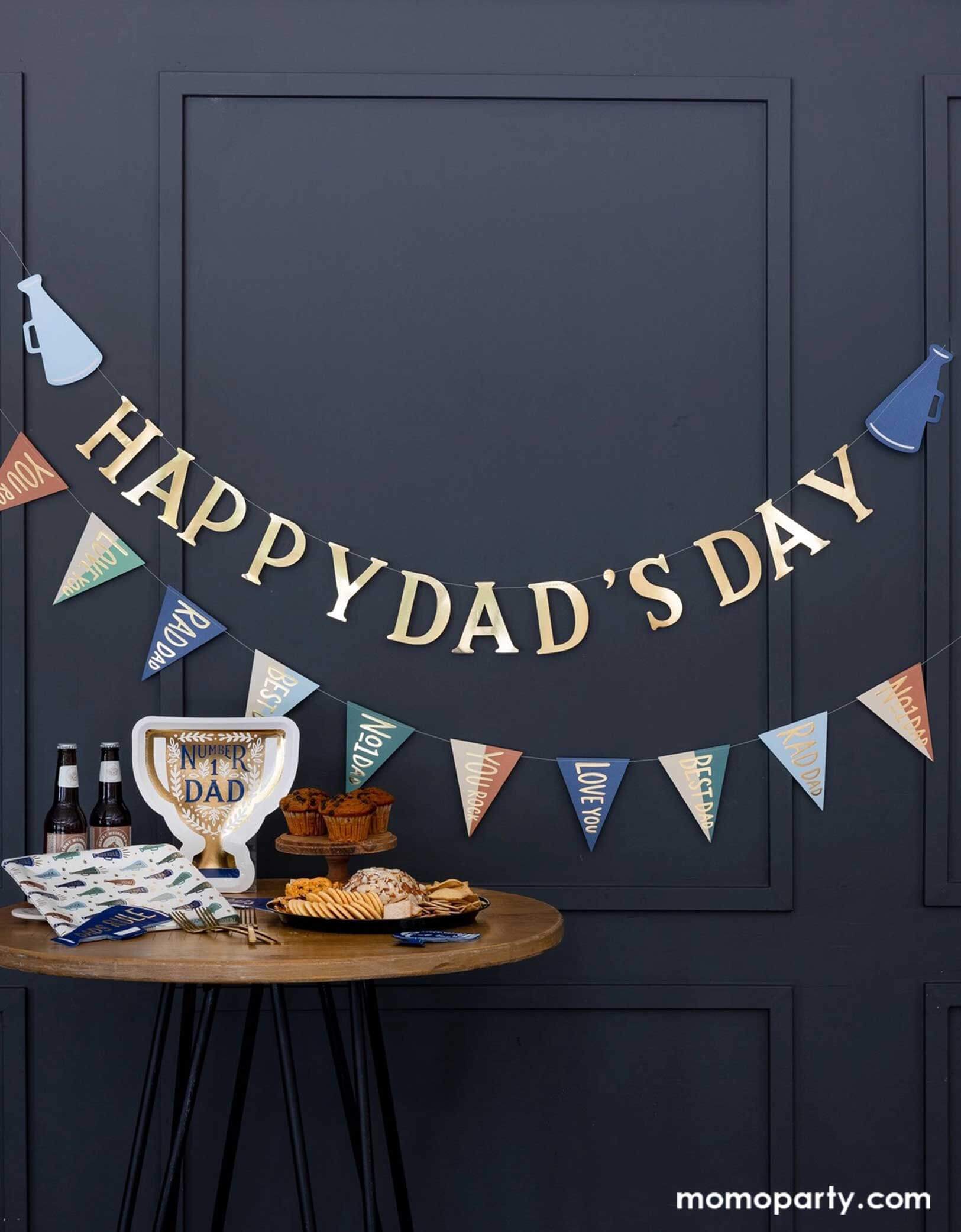 Momo Party's 6' Father's Day Banner Set by My Mind's Eye. This banner sets comes in 2, one says Happy Dad's Day, the other has pennant flags. Perfect for a Father's Day party, this banner adds a fun touch to your décor. Show your dad some love with this unique and playful set. Order now and make your celebration one to remember!