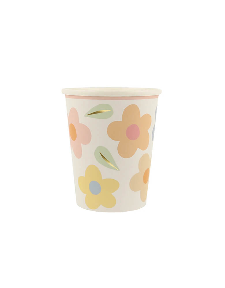 Momo Party's 9oz happy flower party cups by Meri Meri. This adorable set of 8 cups features pastel daisy patterns that will transport you back to the 90s. Perfect for any flower lover, these cups are sure to bring a smile to your face.