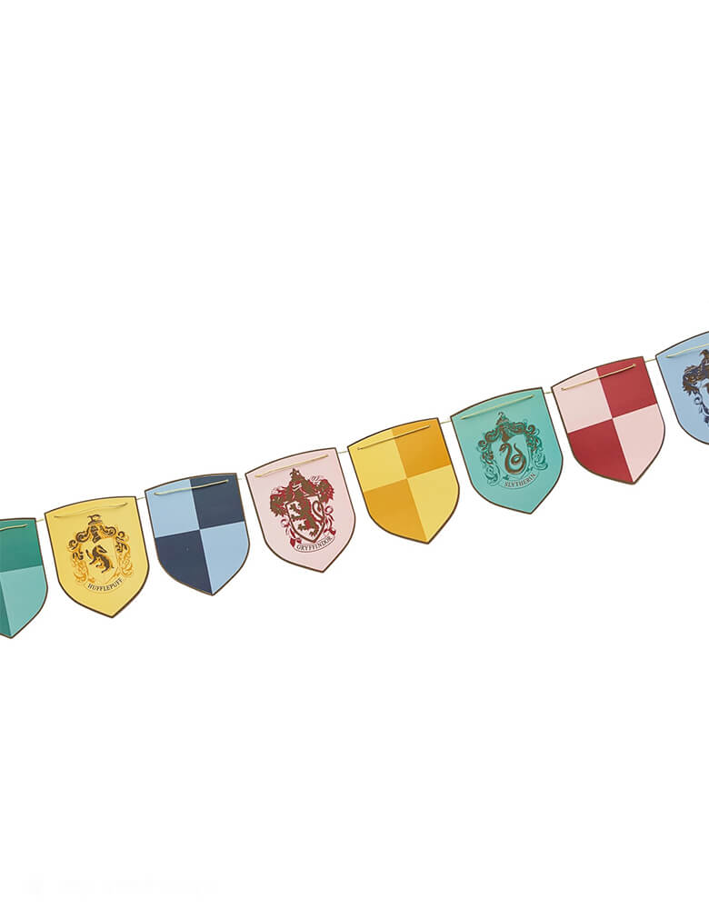 Momo Party's Harry Potter 12 ft Multicolor Decorative Hogwarts Banner by Bonjour Fete. The banner features multicolored pennants, each represent the house from Hogwarts including Hufflepuff, Ravenclaw, Slytherin and Gryffindor. It's perfect to set the scene for your Harry Potter themed celebration!