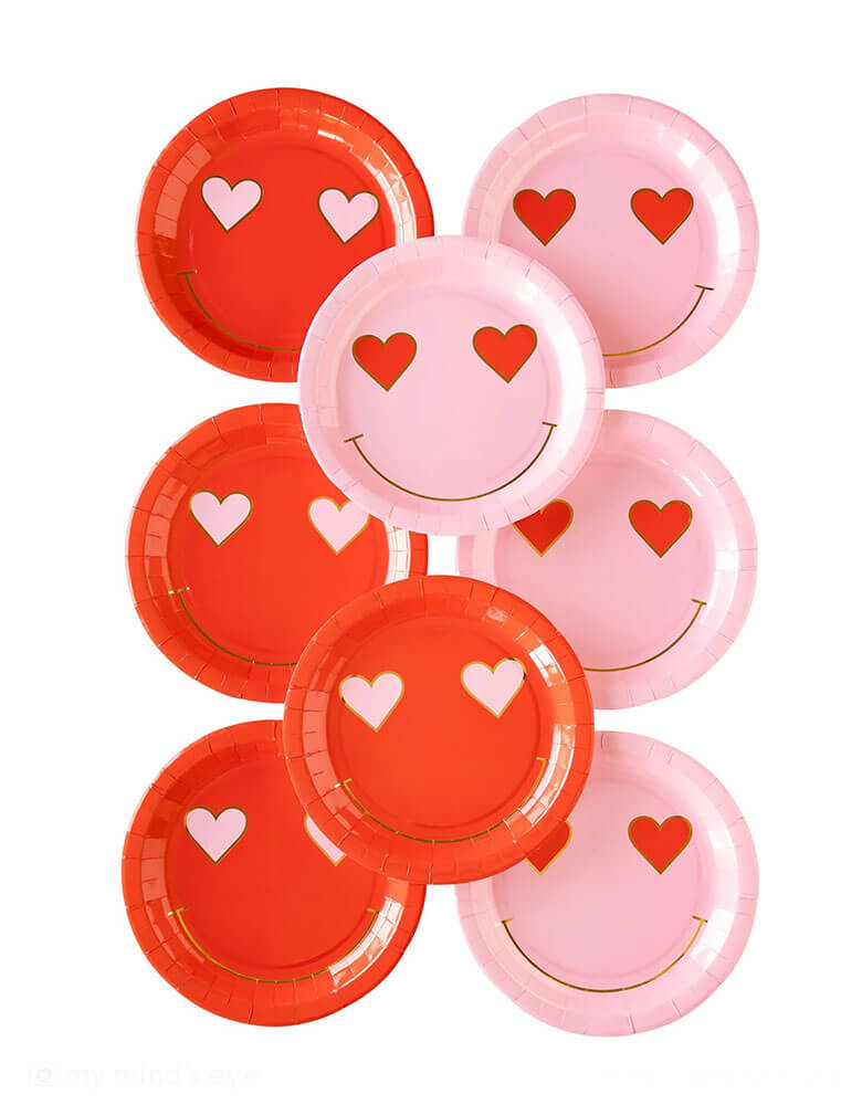 Momo Party's 9" x 9" heart eyes round paper plates in red and pink by My Mind's Eye. Comes in a set of 8 plates, these fun party plates are perfect for Valentine's Day celebrations, it's sure to bring a smile to faces with its cute heart eyes design. Get your hands on it and let the love shine!