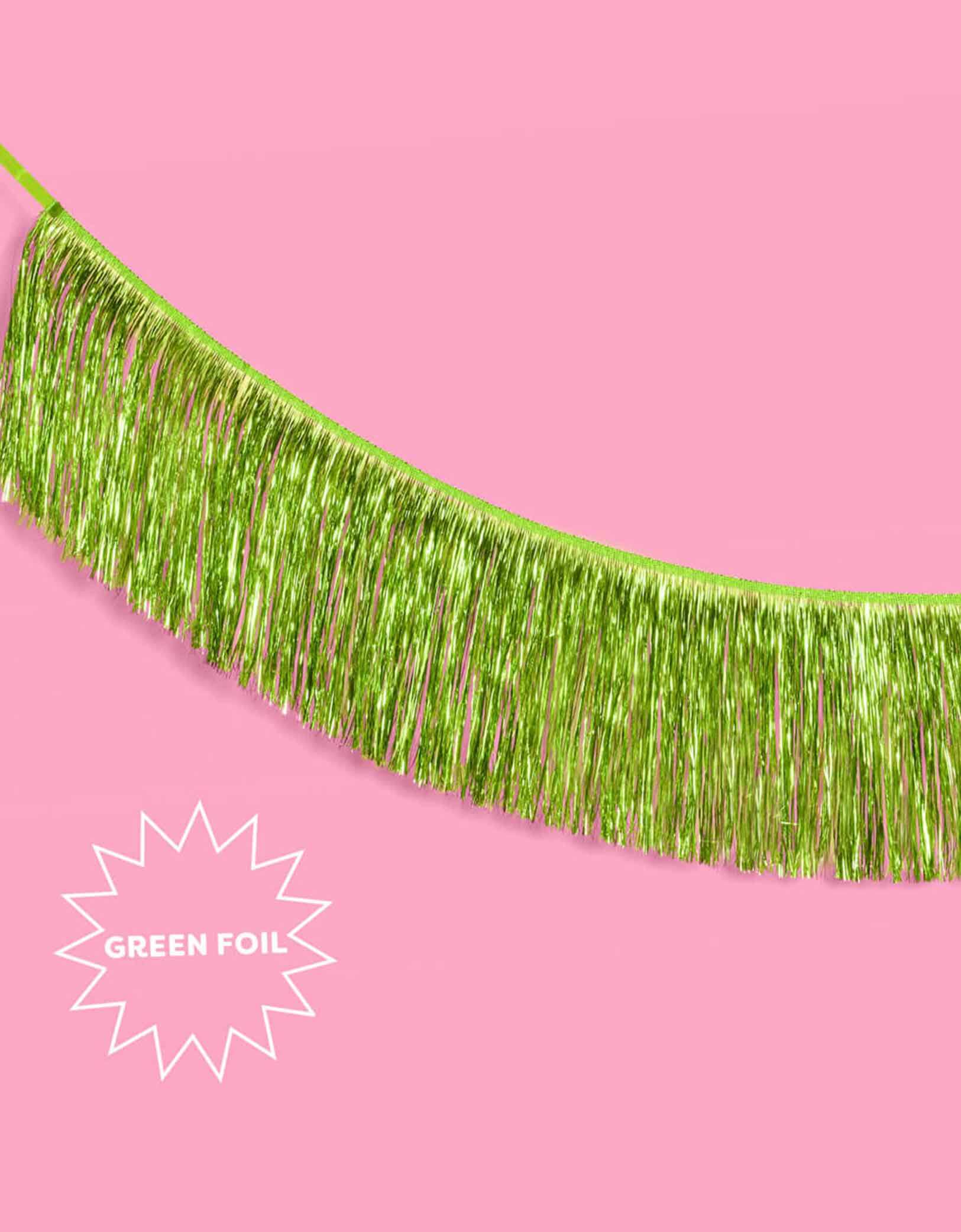Momo Party's 4.43 feet Lime Green Fringe Garland by Xo, Fetti. Perfect for any celebration, it'll add just the right touch of shimmer. You'll love it for Wicked themed celebration or kid's safari, dinosaur themed birthday parties!