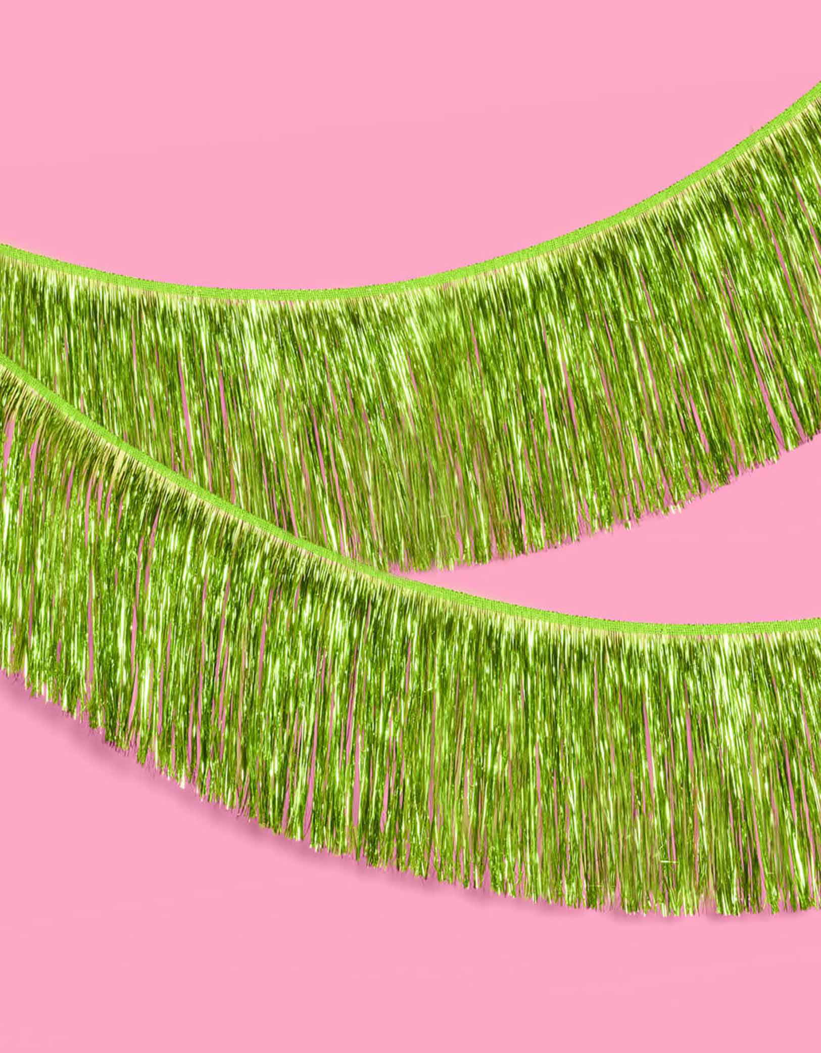 Momo Party's 4.43 feet Lime Green Fringe Garland by Xo, Fetti. Perfect for any celebration, it'll add just the right touch of shimmer. You'll love it for Wicked themed celebration or kid's safari, dinosaur themed birthday parties!