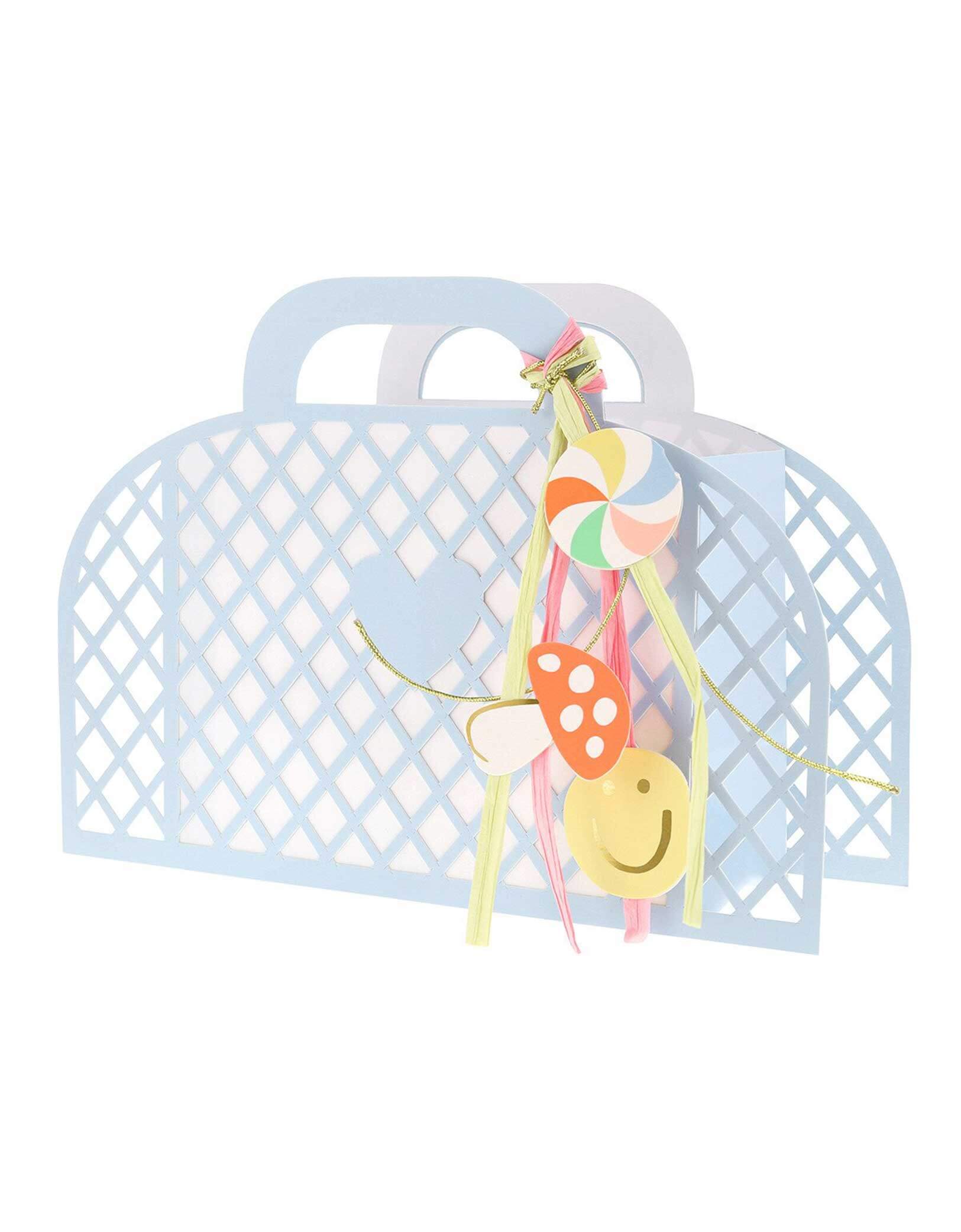 Momo Party's pastel blue paper tote basket with decorative keychain charm elements by Meri Meri on a white background.