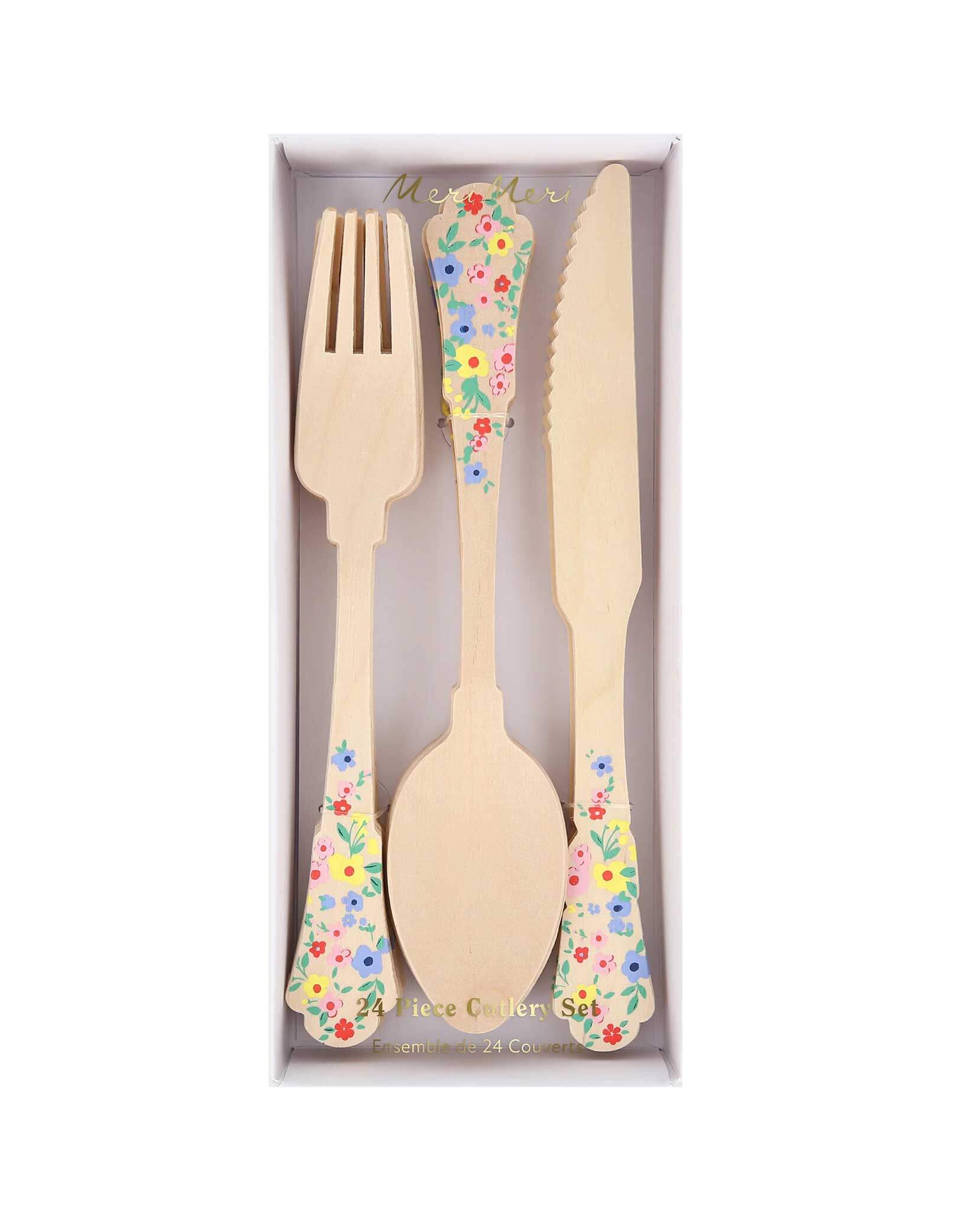 Momo Party's Elegant Floral Wooden Cutlery Set by Meri Meri in its package. Made of eco- friendly birchwood with sculpted handles, they are 100% biodegradable. This set features colorful floral handles for a fresh, summery look. Perfect for a garden party, Mother's Day celebration for a girl's tea party birthday celebration.