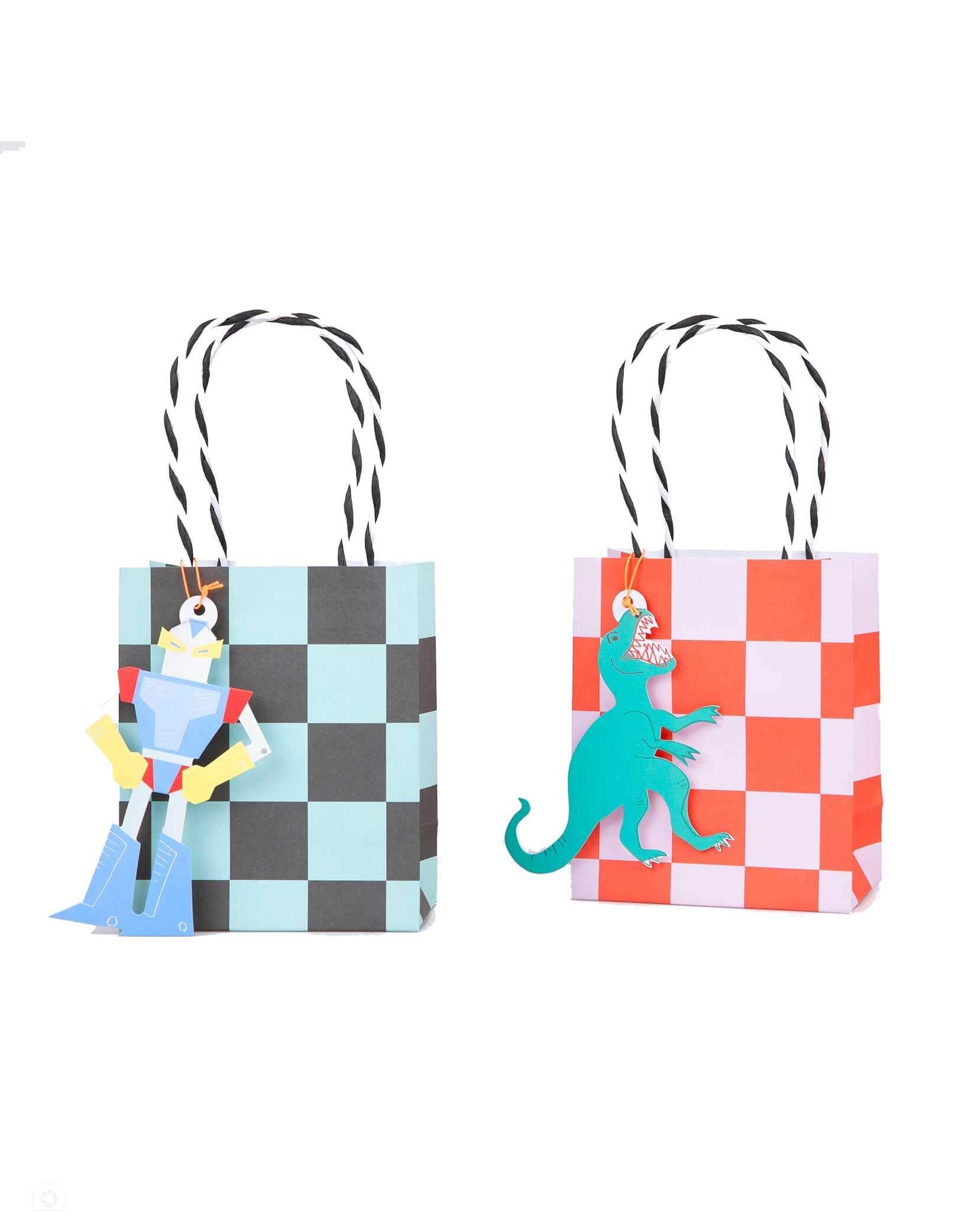 Momo Party's Toybox Icon Party Bags by Meri Meri. Fun and nostalgic, these classic toy box icons including race cars, monster trucks, smiley faces, googly eyes and robots will appeal to both kids and adults celebrating the joy of play. The bold and bright retro designs of these party bags with checker board designs will instantly make your party guests feel happy! They each come with a colorful sticker!
