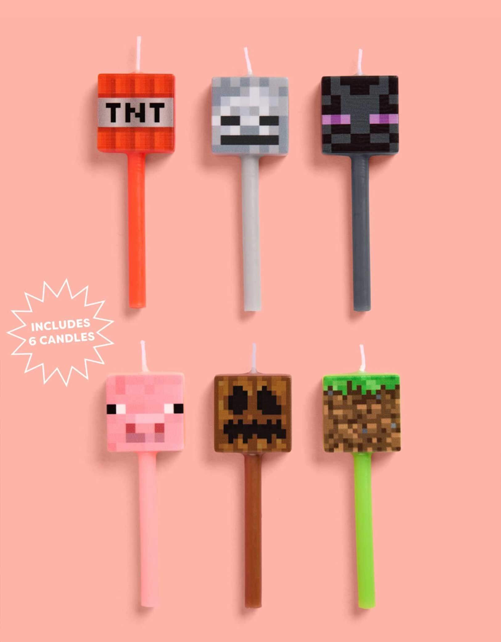 Set of six Momo Party's 3" Minecraft-themed birthday candles featuring TNT, pig face, Enderman and pixel faces on a pink background.