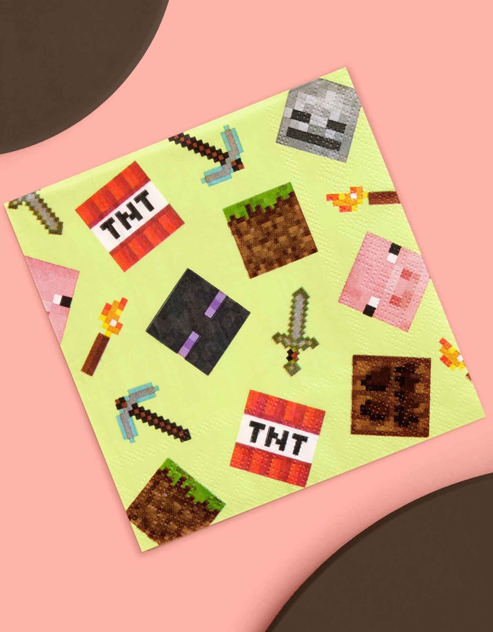 Momo Party's 5" x 5" Minecraft-themed decorative paper napkins with pixelated icons on a pink and brown background.