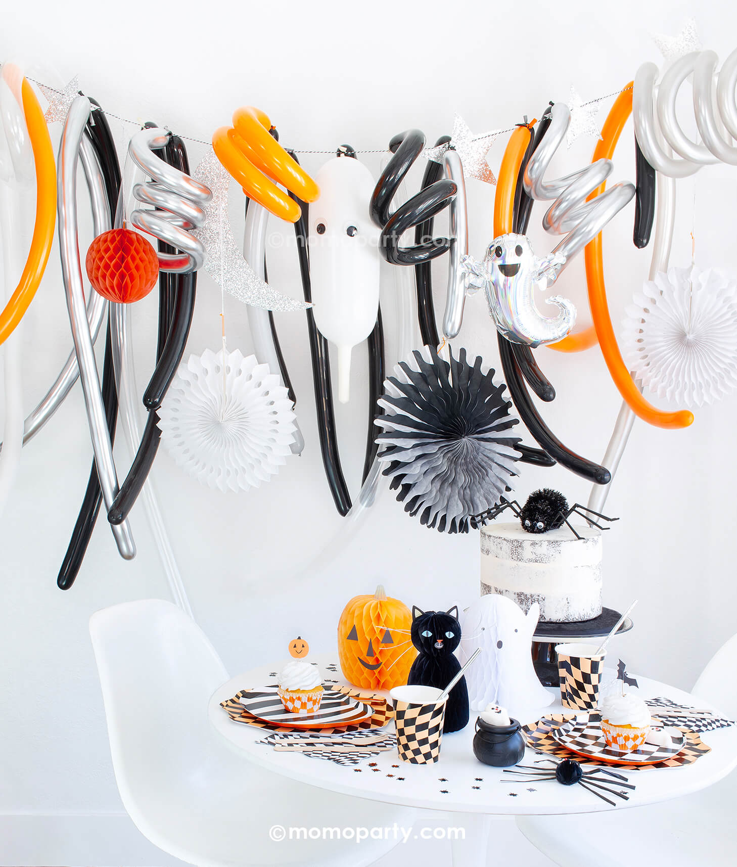 Halloween Party in a Box Kit - Spooky Fun Halloween Box by Momo Party.  Make a freaky fun Halloween celebration with this eerie Halloween party box featuring retro inspired Halloween goods in the classic Halloween colors of orange and black