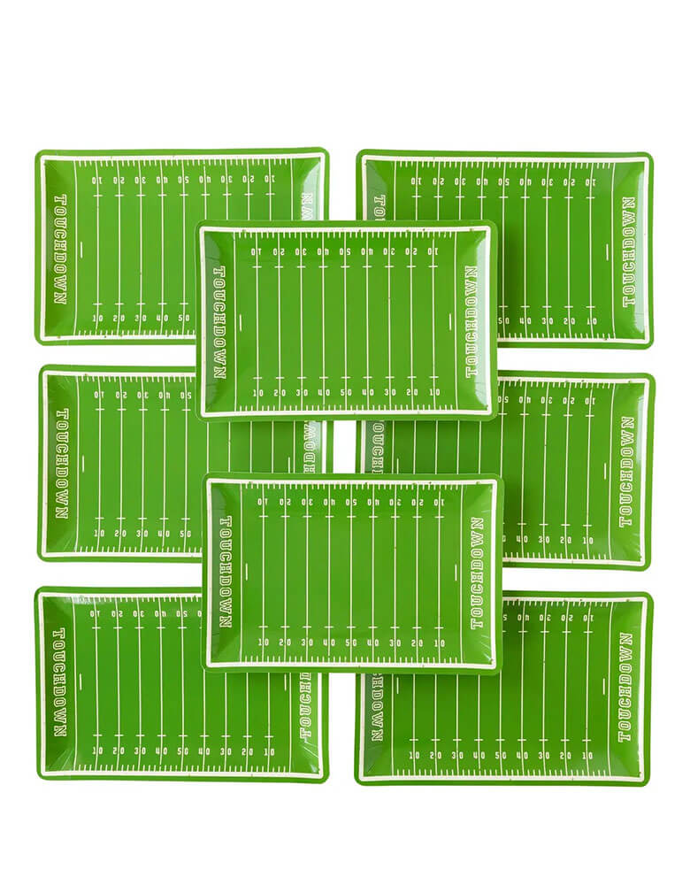 8 of Momo Party's 7.25" x 11" football field shaped large plates by My Mind's Eye. These football field paper plates are feature a grid iron design that are the perfect way to make sure that your guests will have plenty of treats from kick off to the final whistle! They're perfect for a football watching party, a super bowl party, or a tailgate party.