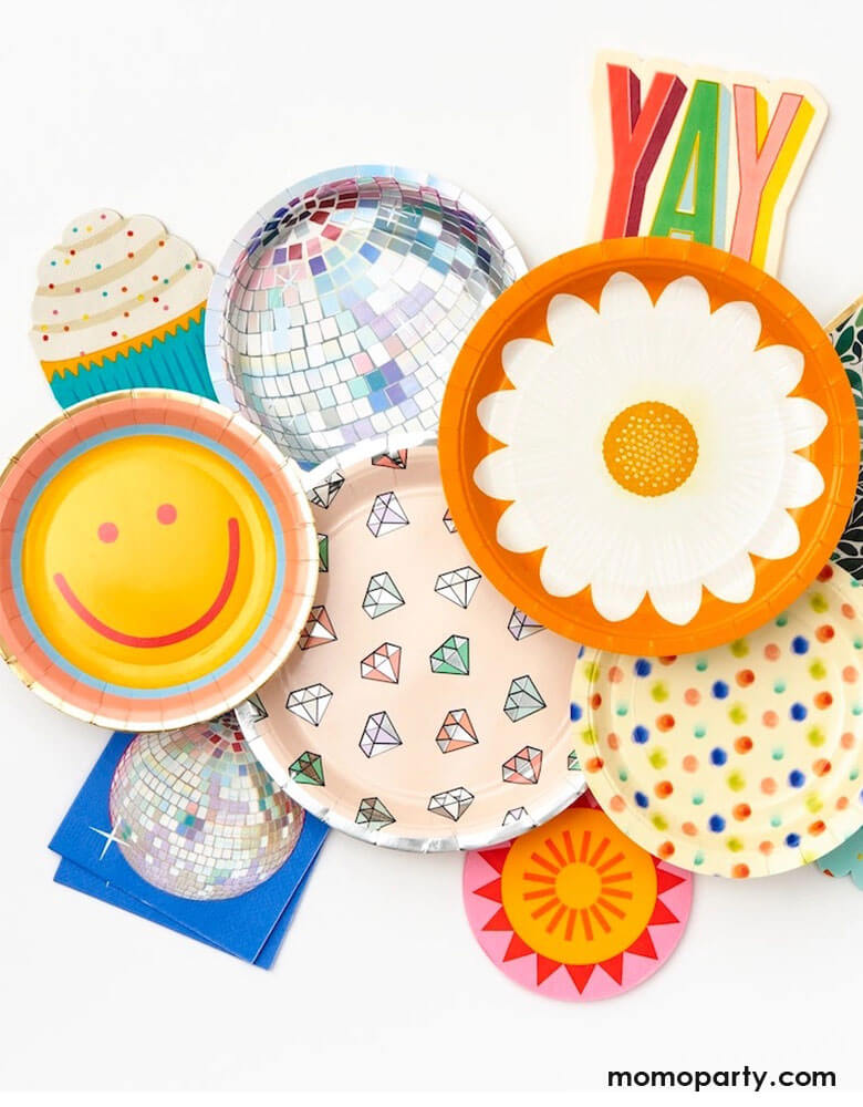 A bunch of colorful, bright paper plates and napkins by Paper Source.