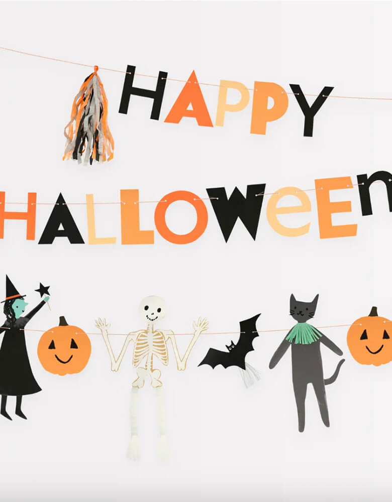 Momo Party's 7' Happy Halloween garland set by Meri Meri featuring Paper tassels made with shiny silver, orange, black and white crepe paper and silver metallic thread White tissue paper streamers on the ghosts Bamboo wand for the witch to hold, simply attach to the double sided tape on the witch's hand Mint raffia fringe on the cat White honeycomb tissue paper on the skeleton legs. Perfect for kid's friendly non-spooky Halloween celebration!
