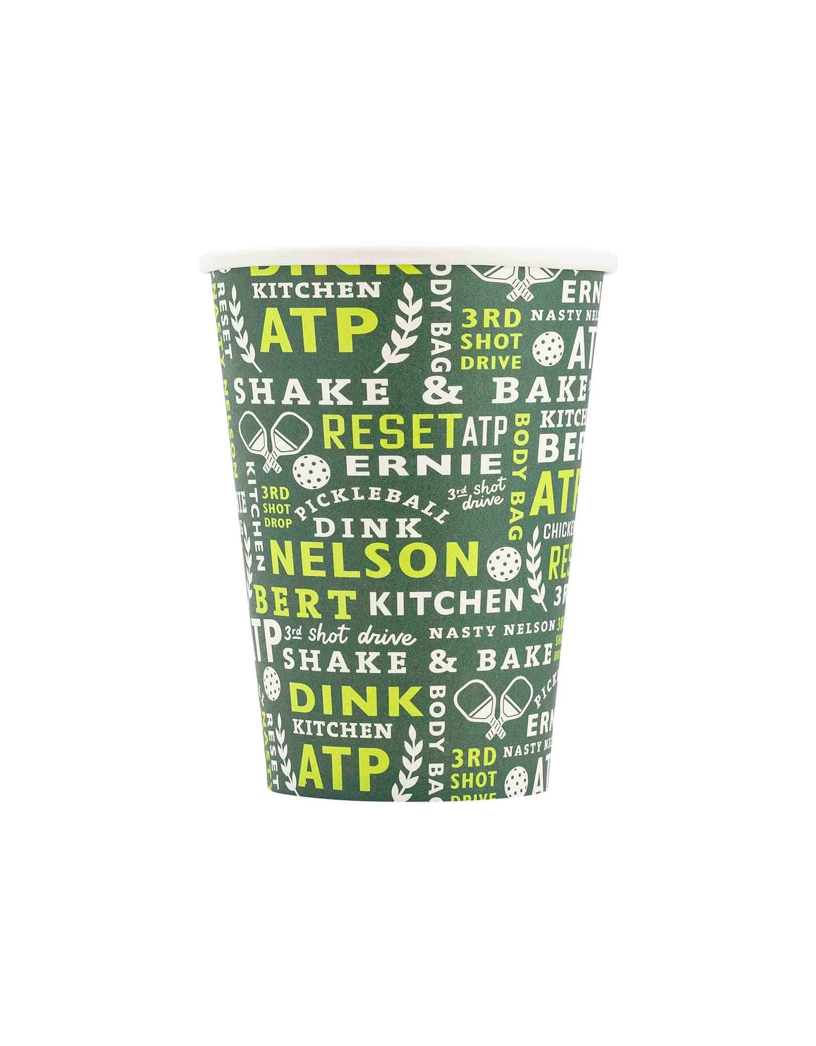 Momo Party's 12 oz Pickleball Paper Cup with various pickleball sayings on it in green and bright yellow by My Mind's Eye on a white background.