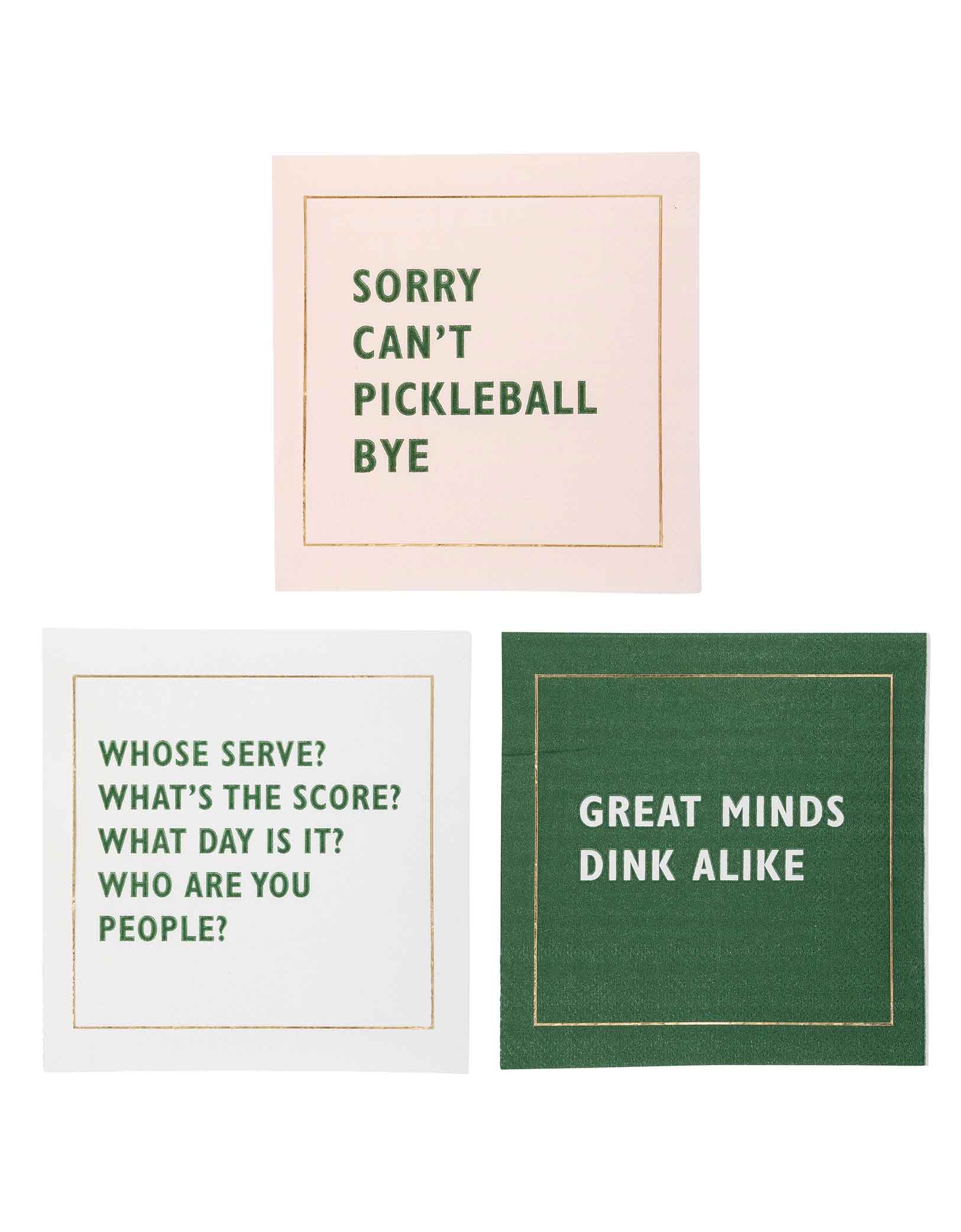 Three Momo Party's 5" small party napkins with pickleball-themed sayings in pink, green and white by My Mind's Eye on a white background.