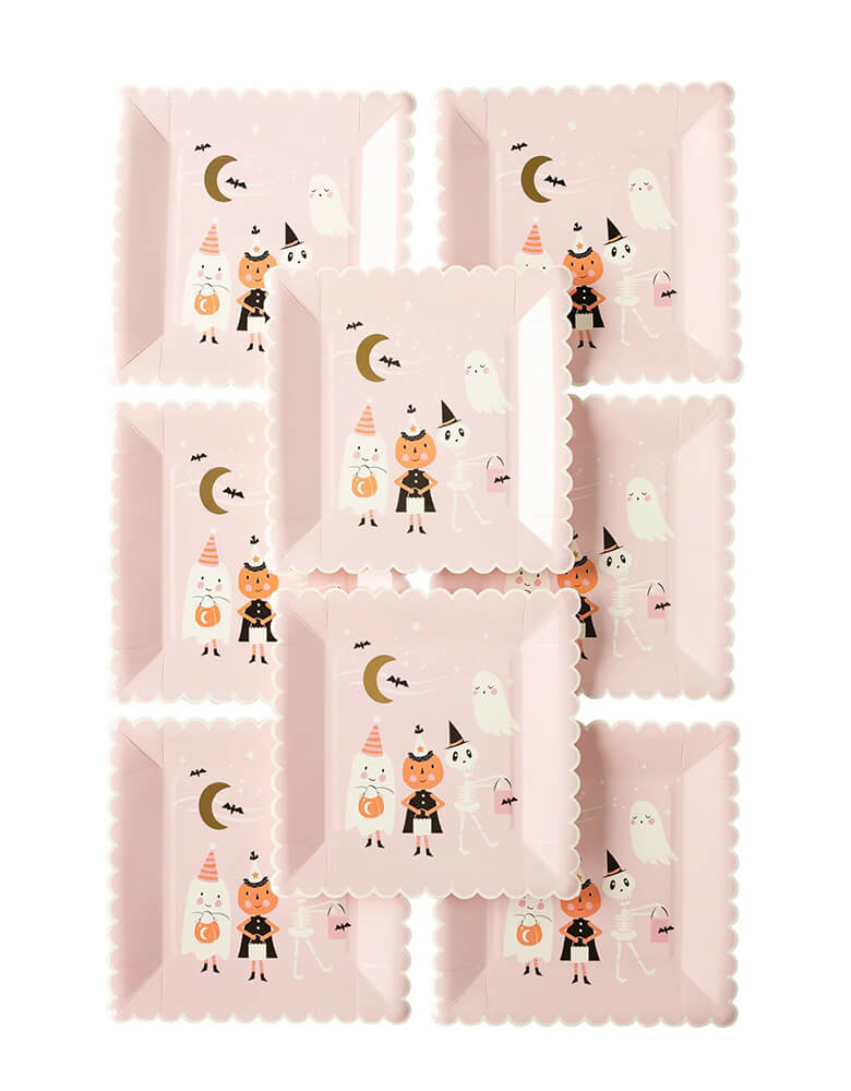 Momo Party's 8" x 8" ghoul gang scene paper plates by My Mind's Eye. Comes in a set of 8 light pink plates, these scalloped edged paper plates feature friendly fiends including two adorable ghosts with party hats, a pumpkin and skeleton that are sure to send a shiver down party goers spines at your Halloween gatherings!