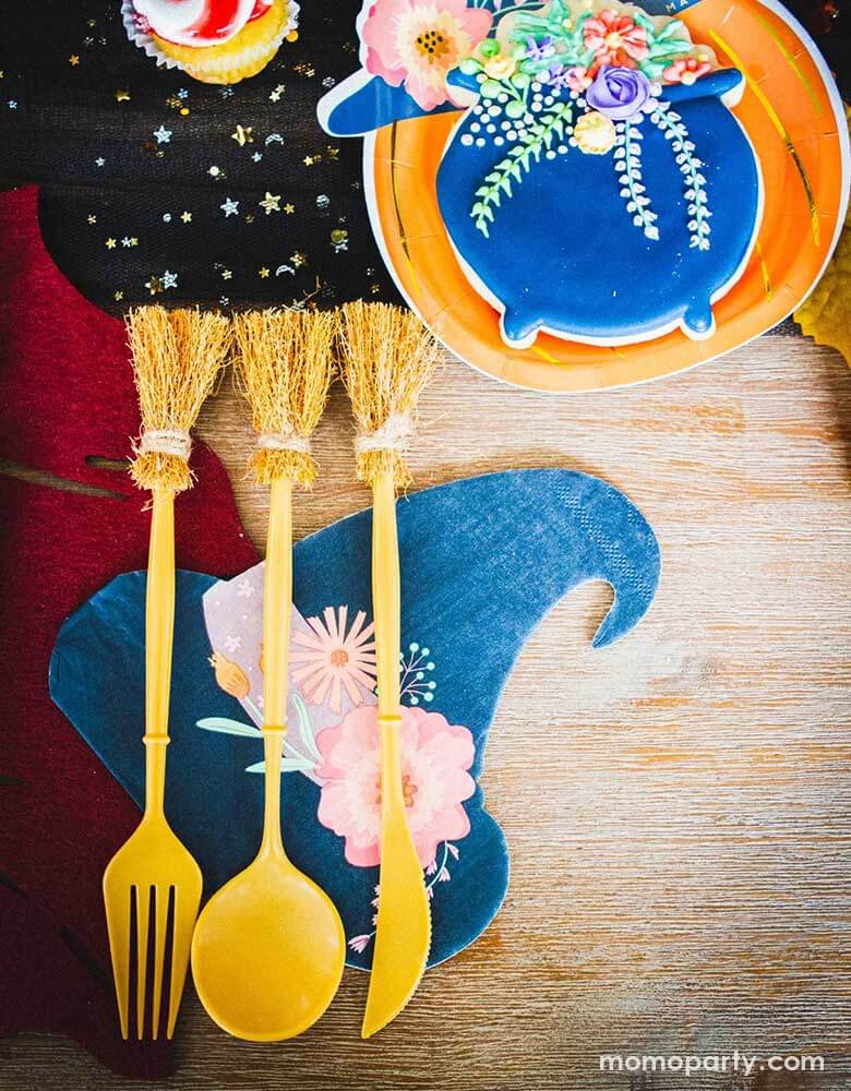 Momo Party's Witch's Broom Cutlery Set and Witch's Hat Shaped Napkins by Ma Fete. Witch’s broom inspired set of disposable cutlery to make tasty Halloween treats even more fun! Perfect for little witches and wizards to enjoy party snacks alongside our matching cups and plates for a truly spooky eating experience!