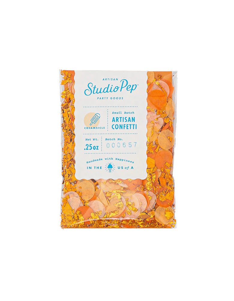 Momo Party's Creamsicle Orange Artisan Confetti Mini Bag by Studiopep. This mini bag of orange confetti is perfect for mix and match. Great for your Halloween party, construction themed birthday, or a summer party! Pressed from American-made premium tissue paper.