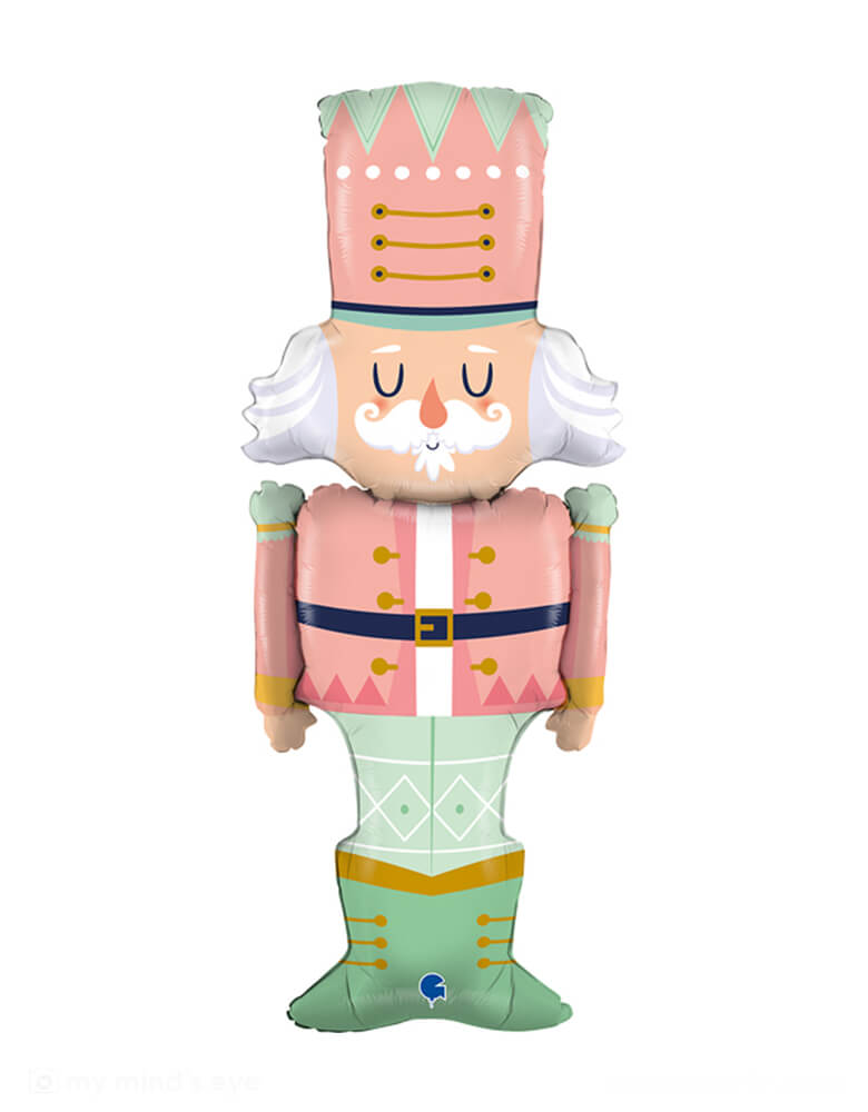 Momo Party's 50" pink and mint pastel Nutcracker foil mylar balloon. Fun and festive add some sparkle to your Christmas celebration with this unique pink Nutcracker foil balloon! Surprise your guests with this whimsical take on a classic holiday decoration. Perfect for creating a cheerful atmosphere! This balloon includes a self-sealing valve, preventing the gas from escaping after it's inflated.