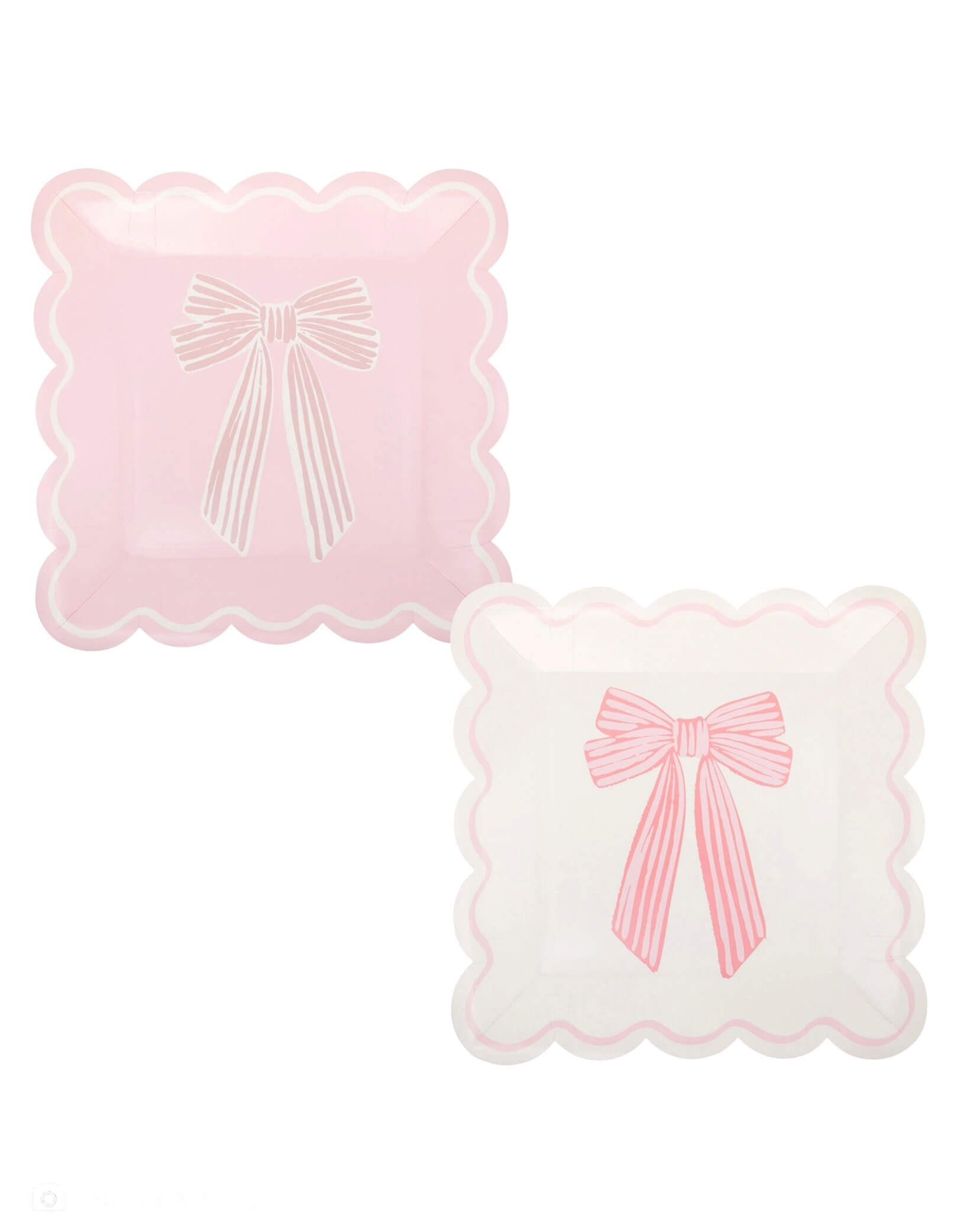 Momo Party's 9" pink and cream scalloped square plates with bow designs on by My Mind's Eye on a white background.