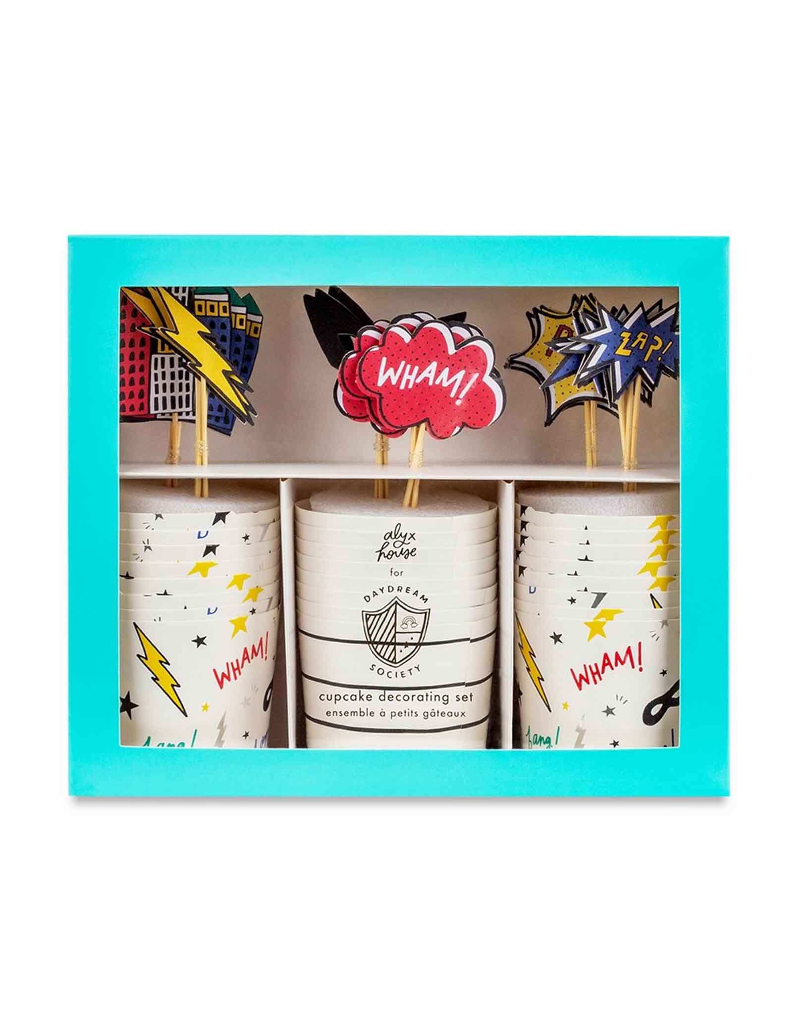 Momo Party's set of superhero cupcake decorating kit with colorful toppers and wraps in a blue box on a white background.