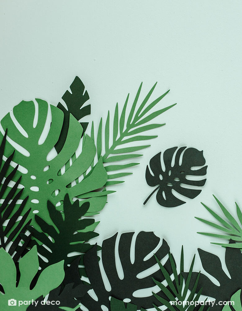 Momo Party's Tropical Leaves Decoration by Party Deco. These unique tropical leaf decorations contain 21 pieces - 7 different shapes of leaves, each shape in 3 shades of green color. Perfect for a tropical themed birthday party, fiesta or summer garden party.