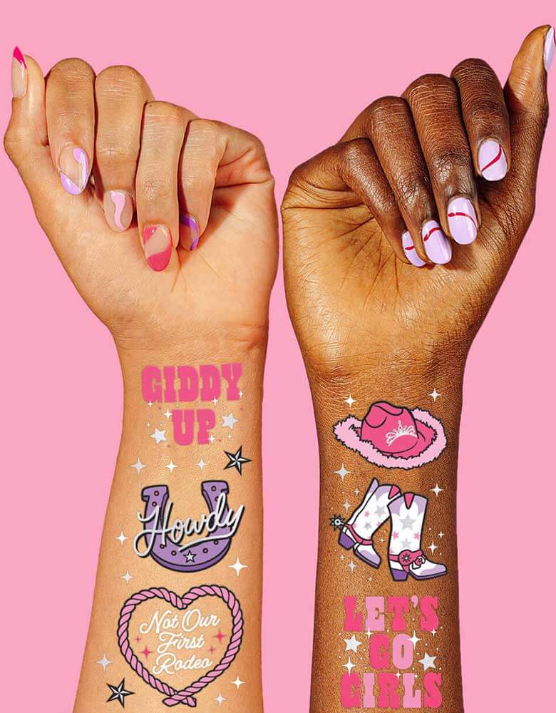 Momo Party's Rodeo Birthday Temporary Tattoos by Xo, fetti on a models arms. Featuring rodeo cowgirl inspired designs including pink cowgirl hats, boots, horseshoe and messages like "Let's Go Girls" "Giddy Up", these temporary tattoos are perfect for girl's rodeo themed birthday party or a bachelorette party!
