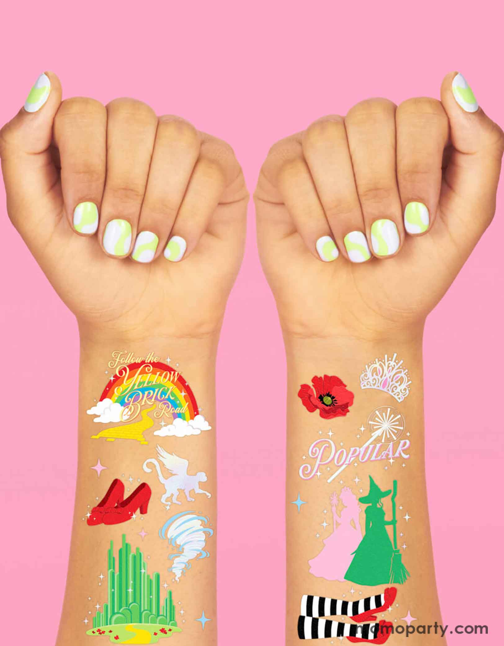 Two arms wearing Momo Party's Emerald City Wicked Witch Temporary Tattoos by Xo, Fetti. Featuring green and pink witches, red heels, rainbows, emerald city and magical icons inspired by the Wizard of Oz. These temporary tattoos are perfect for a Wicked themed birthday party celebration!