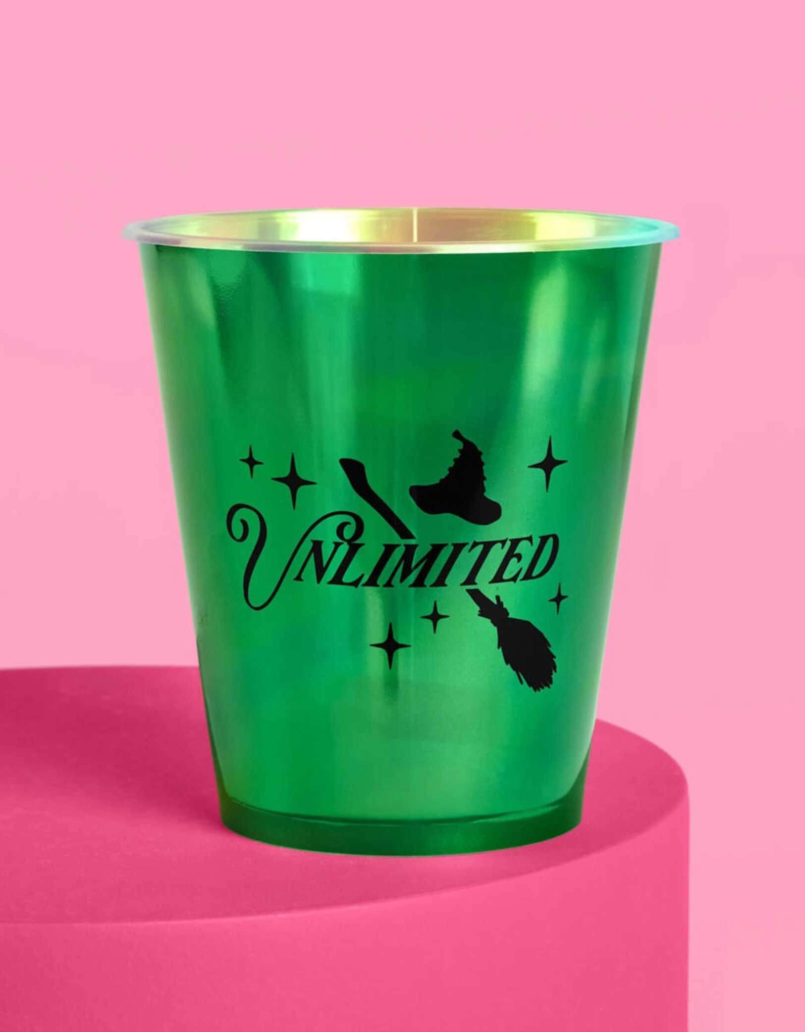 Momo Party's 12oz Wicked witch green plastic cup with 'Unlimited' design on a pink background.
