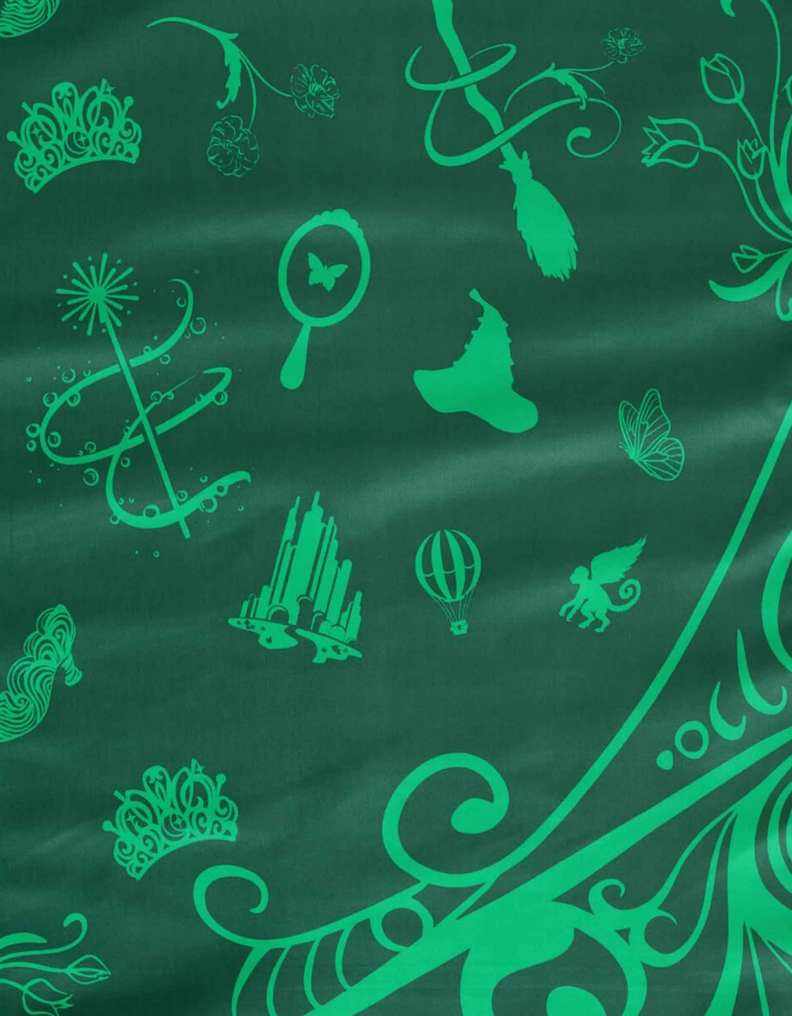 Green wizard themed pattern on a Momo Party's two tone Wicked party tablecloth.