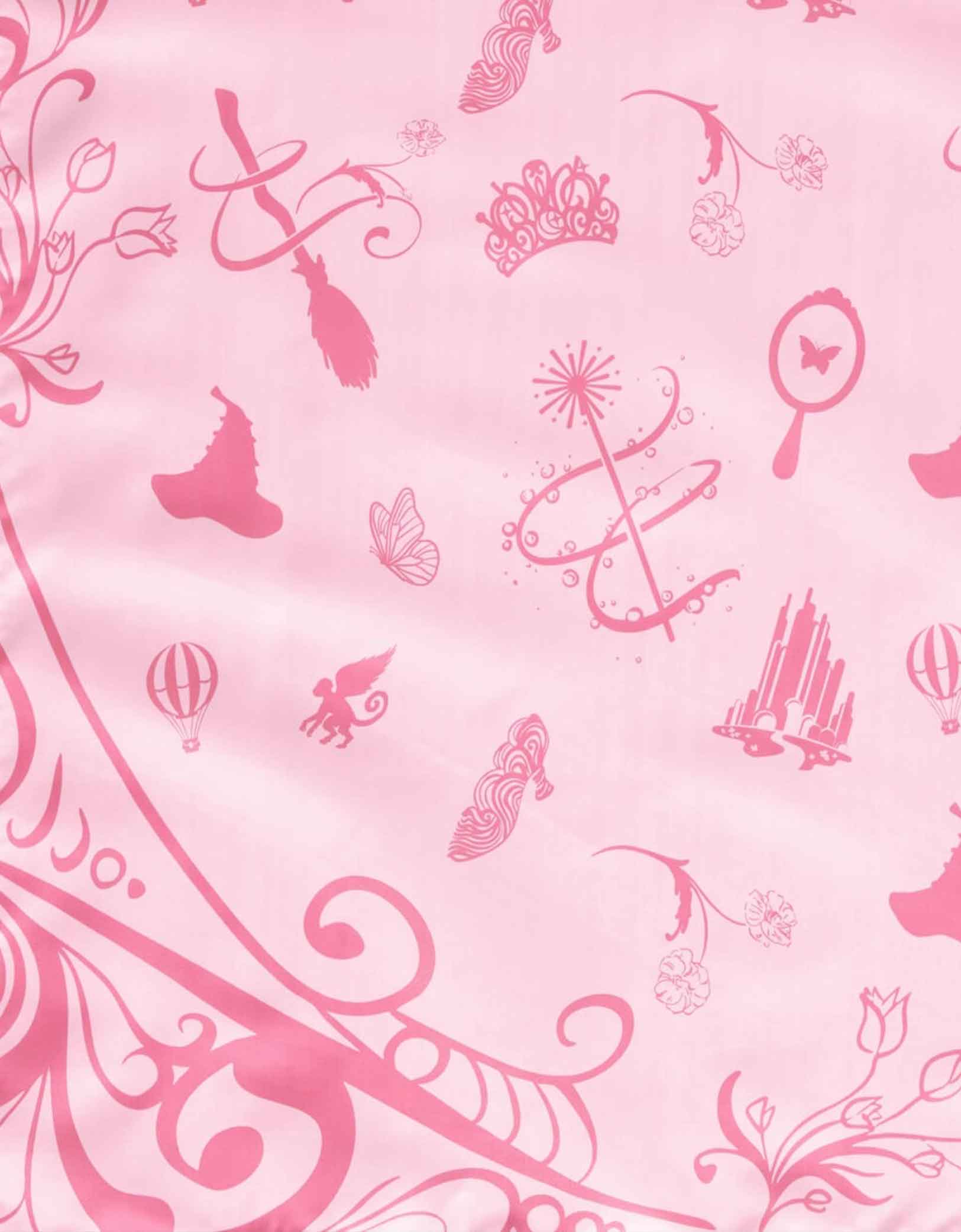 Pink wizard themed pattern on a Momo Party's two tone Wicked party tablecloth.