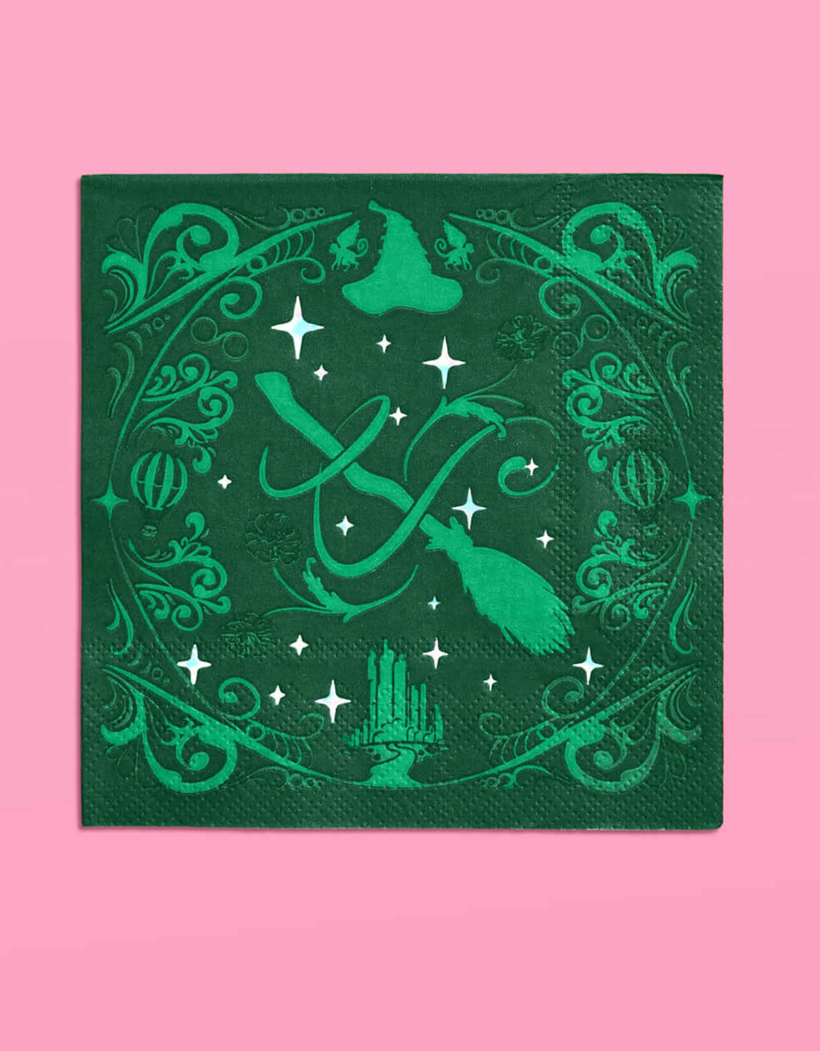 Momo Party's 5" Wicked party paper napkin in green with intricate wizard and Elphaba inspired designs on a pink background.