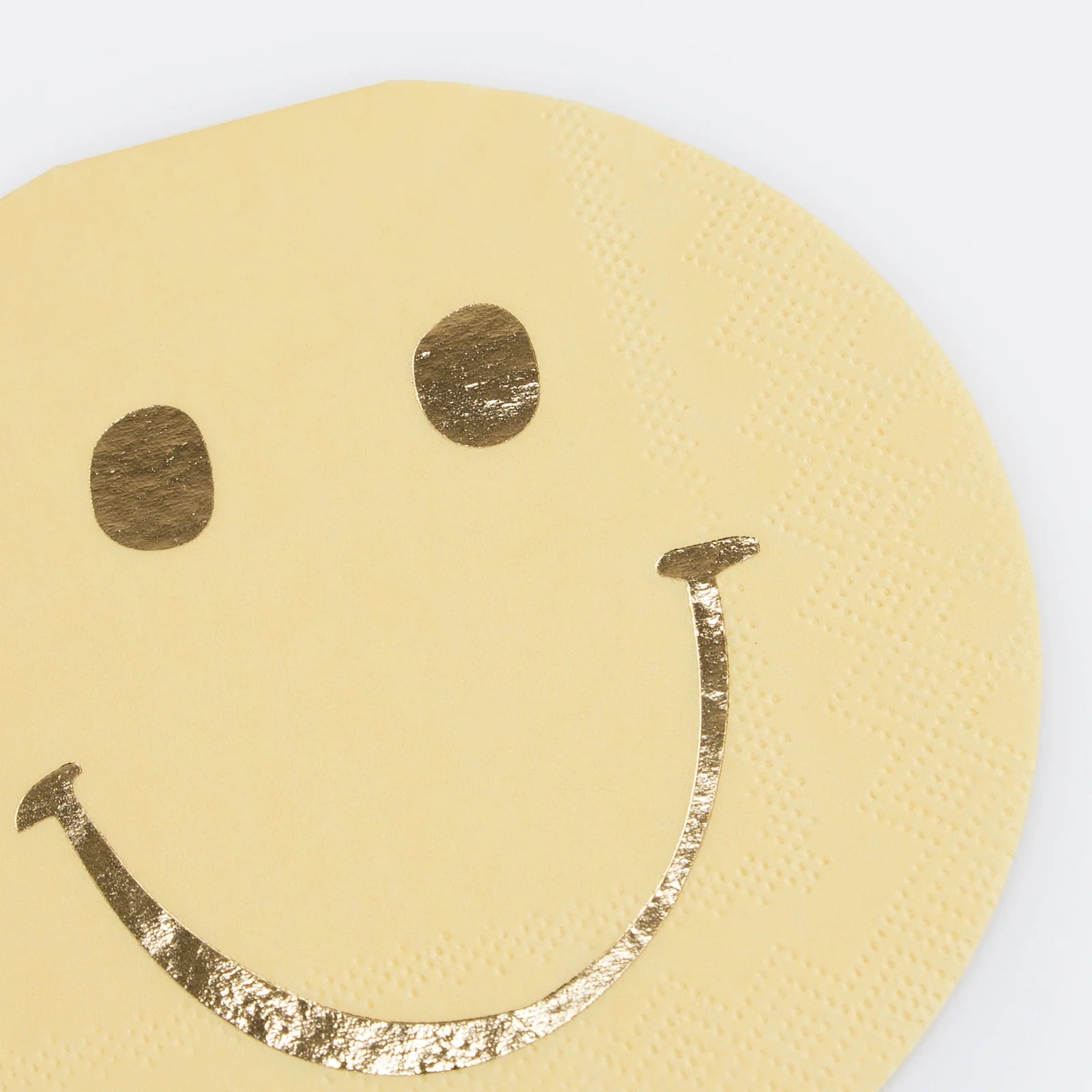 Details of A smiley face with gold details die-cut napkin from Momo Party's Happy Face Icons Diecut Napkins by Meri Meri. This set of napkins are perfect for any happy celebration. Be it a groovy themed party or a retro nostalgia themed celebration.