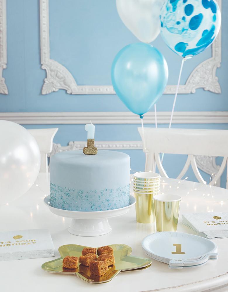 Talking Tables -  We Heart Birthday Glitter Number Candle Blue number 1 over a pastel blue cake for baby boy 1st birthday 