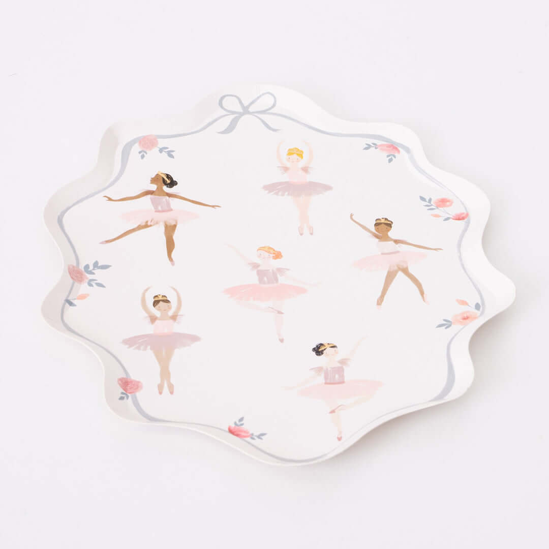 Ballerina Plates by Meri Meri. Featuring beautiful plate with a wonderful curved border, illustrations of dancing ballerinas and flower, ribbon. They will add amazing decor to your Ballerina themed birthday party table, or dance lovers