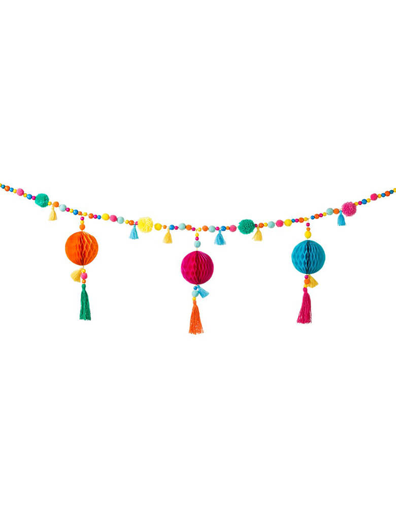 Talking Table_Boho Fiesta Pom Pom Garland with Pom poms and tassels combined with bead and paper honeycomb details for Fiesta party or cinco de Mayo celebrations or home decoration