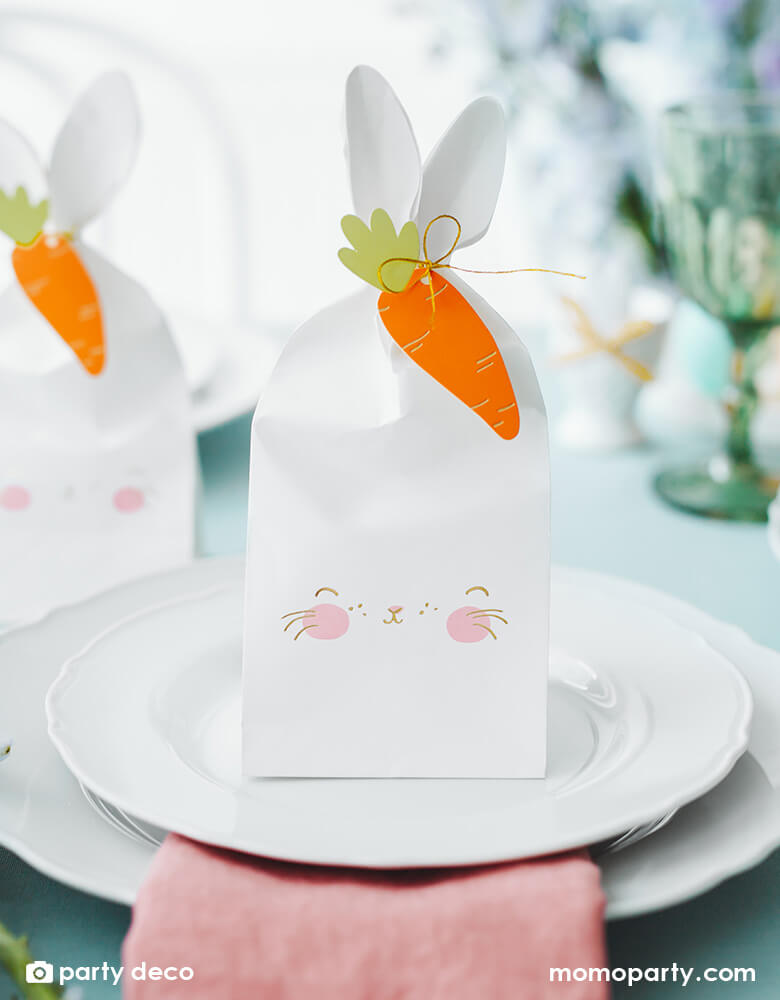 A beautiful Easter table set with Momo Party's 2.95 x 3.5 x 8.8" bunny treat bags by Party Deco. A perfect idea for Easter party table with kids.