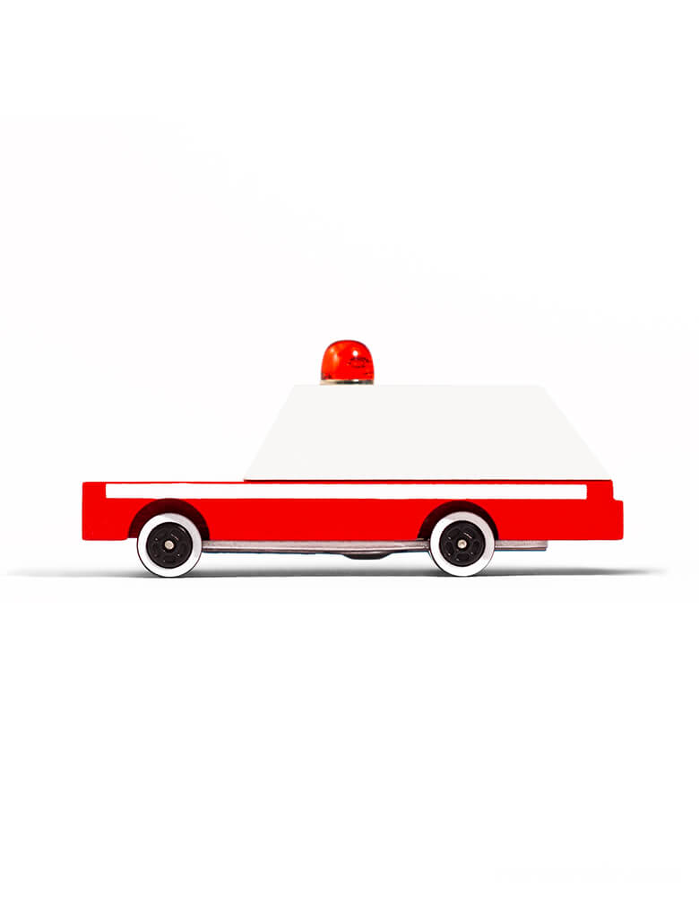 Candylab Candycar Ambulance Toy Car, featuring a unique die-cast wooden car, transferred the fun and spirit of classic matchbox car into this 3.5 inches long solid wooden car with a sturdy alloy diecast base. Made with Solid Beech wood, non-toxic water based paint and clear urethane coat. Die-cast base. White ABS plastic rims, with food grade rubber tires. This cute 3 inches long wooden car toy makes a great party favor for a car themed party, car lover collection, kid's car collection, wooden car toys