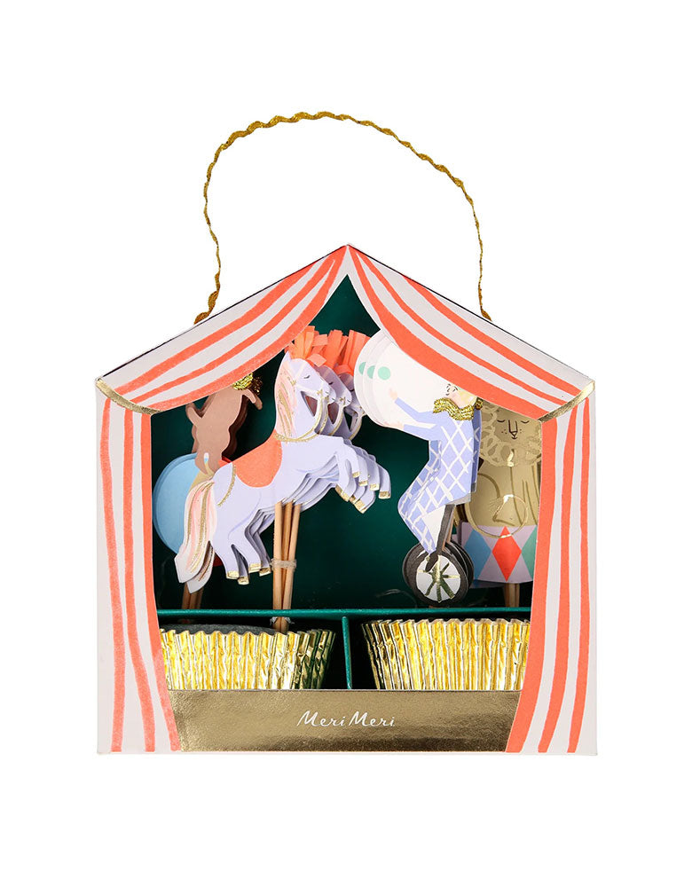 Momo Party's Circus Parade cupcake kit by Meri Meri, comes in a set of 24 fantastic toppers with 4 circus designs, including horses with paper tassels on their heads, a circus dog on a bounce ball, a lion and a circus juggler, and 24 shimmering gold foil cases.
