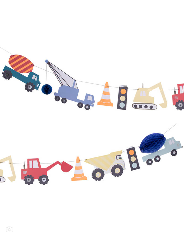 Construction Garland by Meri Meri. This 10ft construction garland, features beautifully illustrated vehicles, with 3D honeycomb paper effects and eye-catching shiny silver foil details, easily turn the party room, or a bedroom, into an amazing construction zone with this colorful garland.