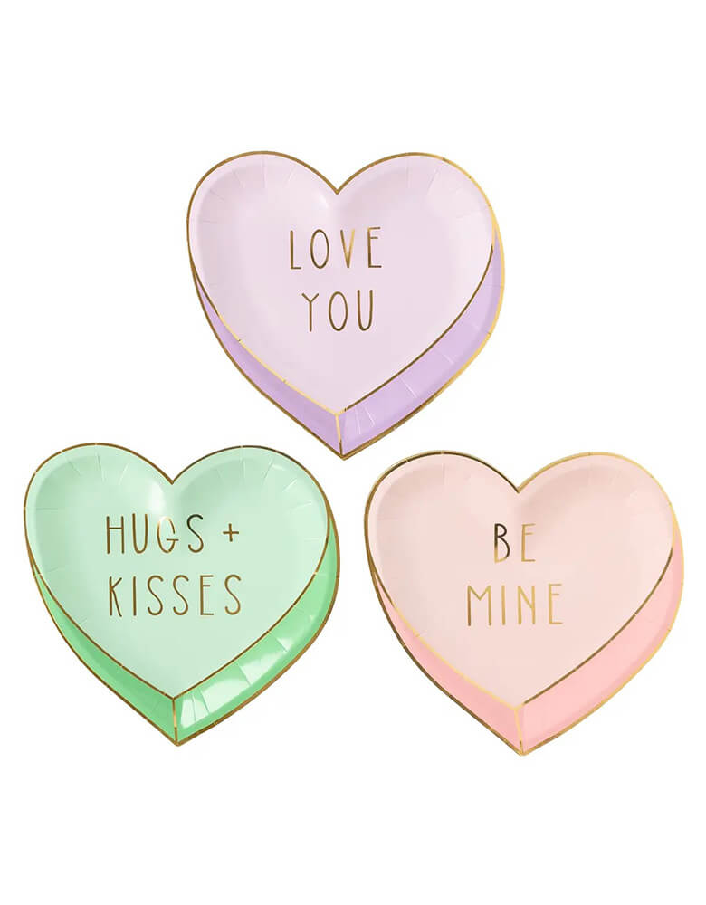 Momo Party's 9 x 9 pastel conversation heart plates by My Mind's Eye, comes in a set of 9 in 3 beautiful pastel colors of mint, purple and pink, this set of candy heart shaped plates is simply oh so sweet for your Valentine's Day party table. Let these conversation heart shaped plates do all the talking for you this Valentines Day: be mine, love you, hugs and kisses.