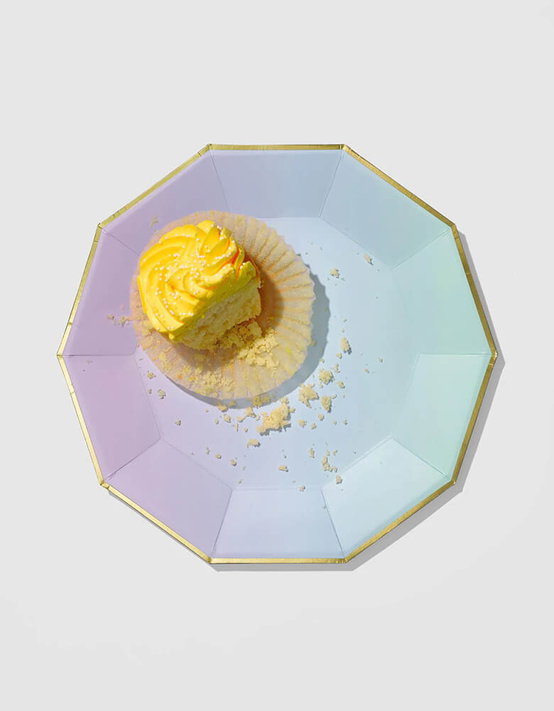 A yellow cupcake on Coterie-Yes-Way-9.25" Ombre-Large-Plates, great for a unicorn or mermaid themed birthday party!
