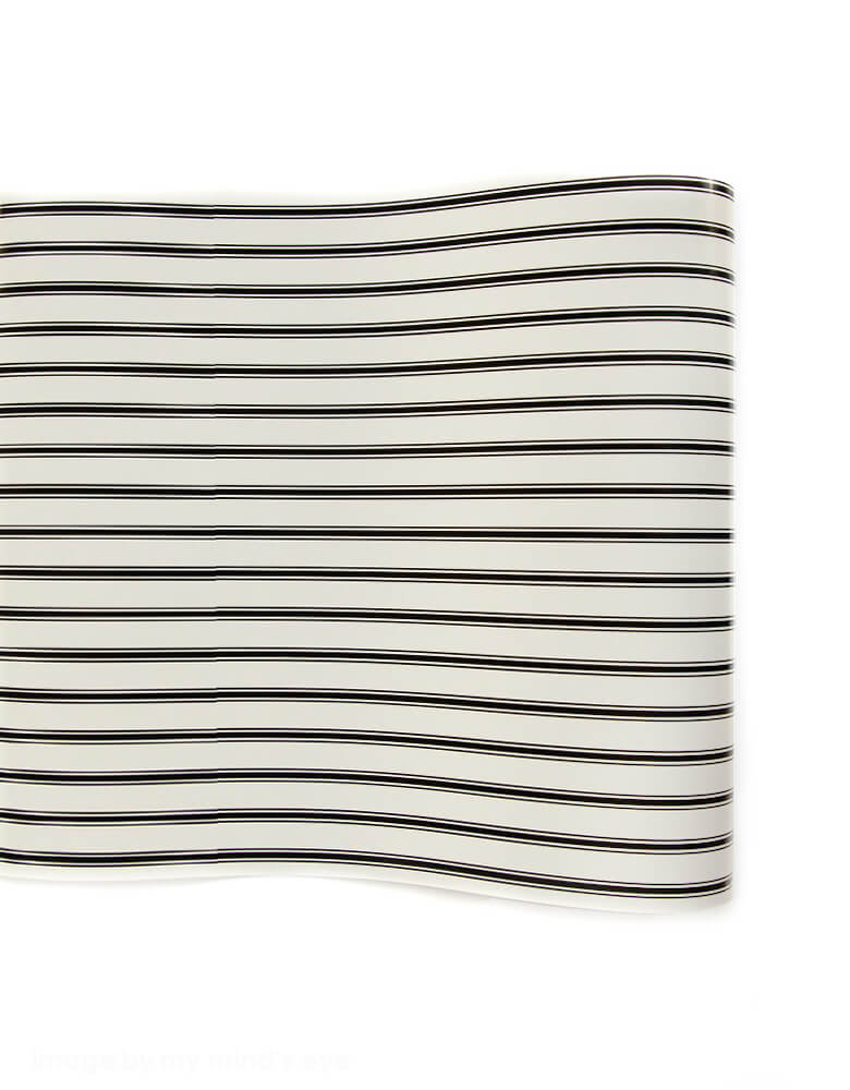 Momo Party's Cream with Black Stripe Table Runner by My Minds Eye'. This 16 inches x 10 ft modern cream with black stripe table paper runner makes a perfect table decoration.