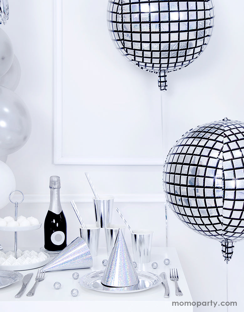 Hip hop disco party with Party Deco sparkly cool disco ball shaped Disco ball foil balloons, champaign bottle, silver iridescent plates, cups and party hats