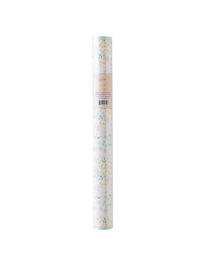 Momo Party's 16 x 120 inches Ditsy Floral table runner by My Mind's Eye. In a beautiful floral design, it's perfect for a spring themed party or an Easter celebration.
