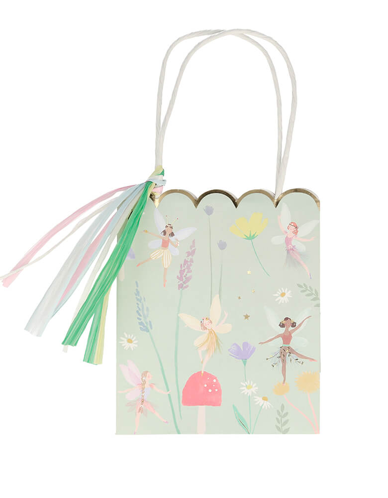 Meri Meri Fairy Party Bags. They are crafted with a stylish scallop edge and feature illustrations of dancing fairies, flowers and toadstools, and golden foil detail. The bags have twisted paper handles and gorgeous raffia tassels.