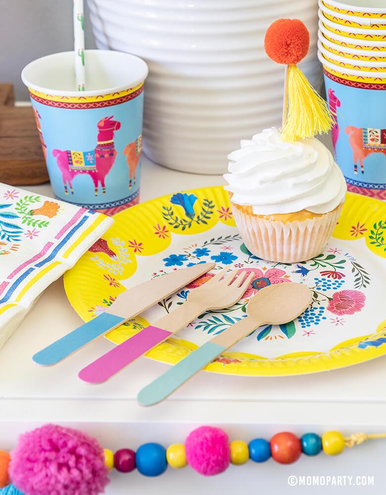 Desert table with Talking Tables 9" Boho Fiesta Floral Plate, Boho Fiesta Llama Cups, Hyper Tropical Wooden Cutlery Set, Boho Fiesta Floral Napkins and Boho Fiesta Pom Pom Garland, for A Boho Fiesta Themed Party, Modern Cinco De Mayo Party