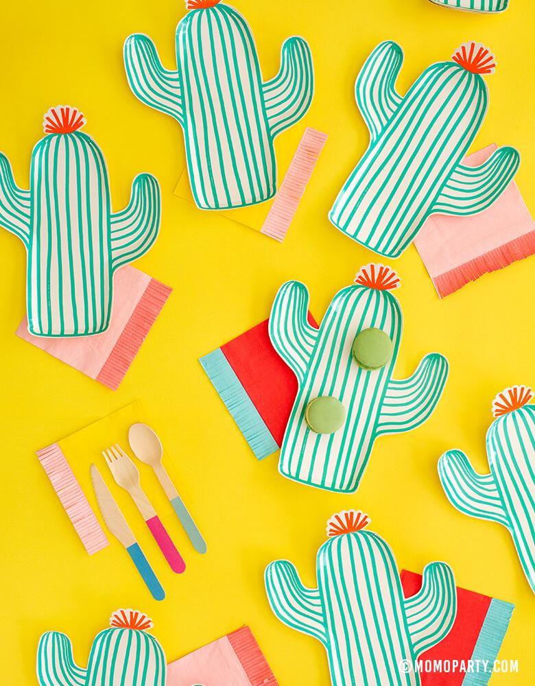 Meri Meri Cactus paper party plates with brightly colored My minds Eyes Hip Hip Hooray Fringe Small Napkins, and Hyper Tropical Wooden Cutlery Set